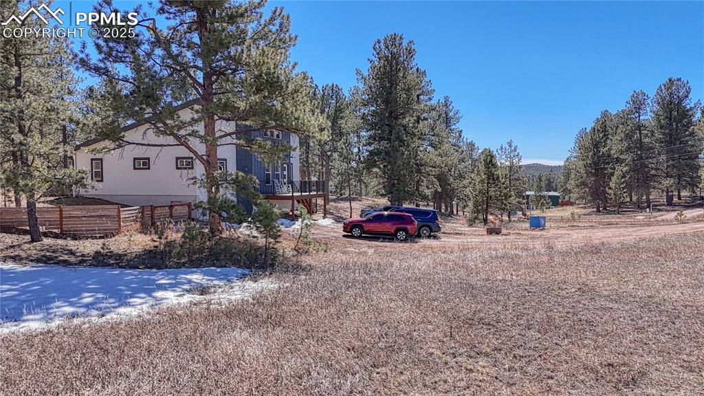 394 Due S Road Florissant, CO 80816 - Photo 19 of 28 a view of a car parked in front of a house