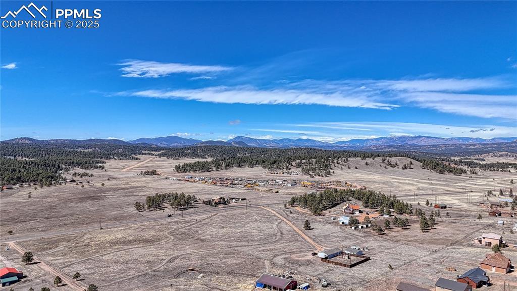 394 Due S Road Florissant, CO 80816 - Photo 21 of 28 a view of a ocean with a beach