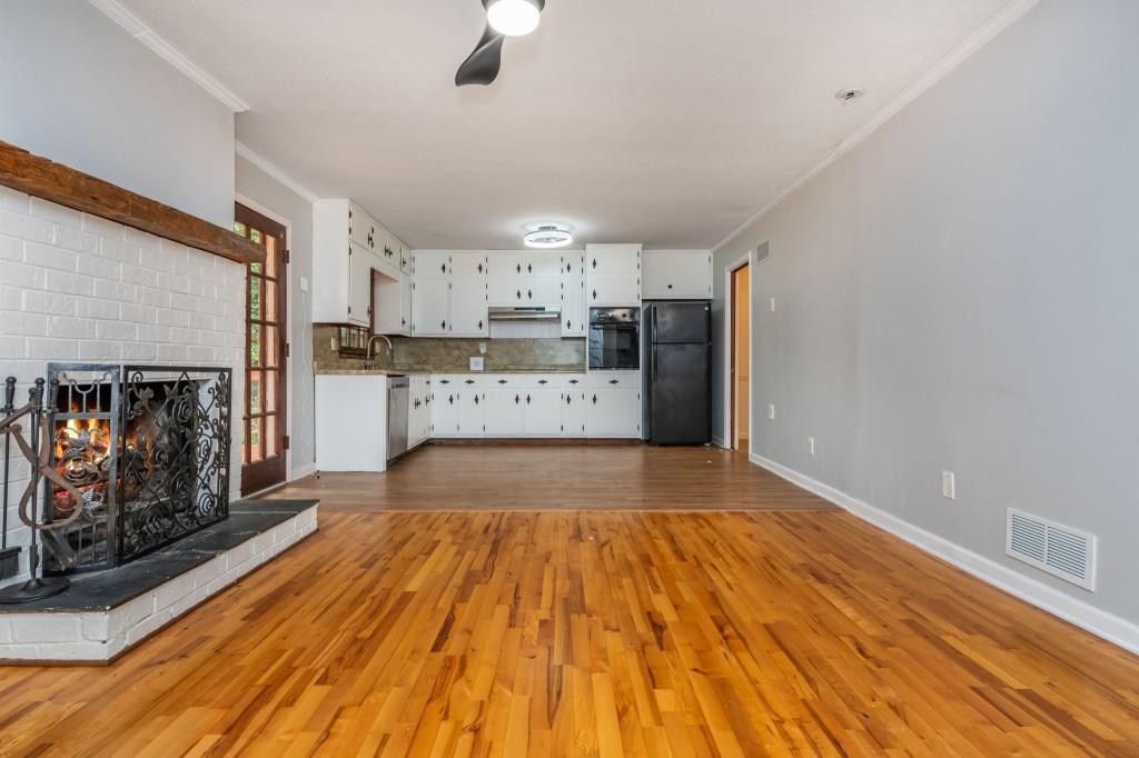 4043 Casa Loma Drive Decatur, GA 30034 - Photo 15 of 36 a view of a kitchen with cabinets and wooden floor