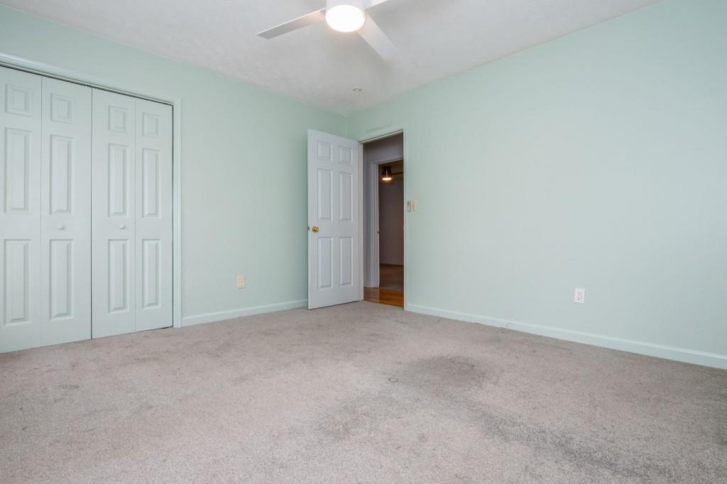4043 Casa Loma Drive Decatur, GA 30034 - Photo 19 of 36 an empty room with a ceiling fan