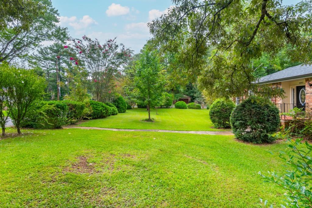 4043 Casa Loma Drive Decatur, GA 30034 - Photo 2 of 36 a view of a golf course with a garden