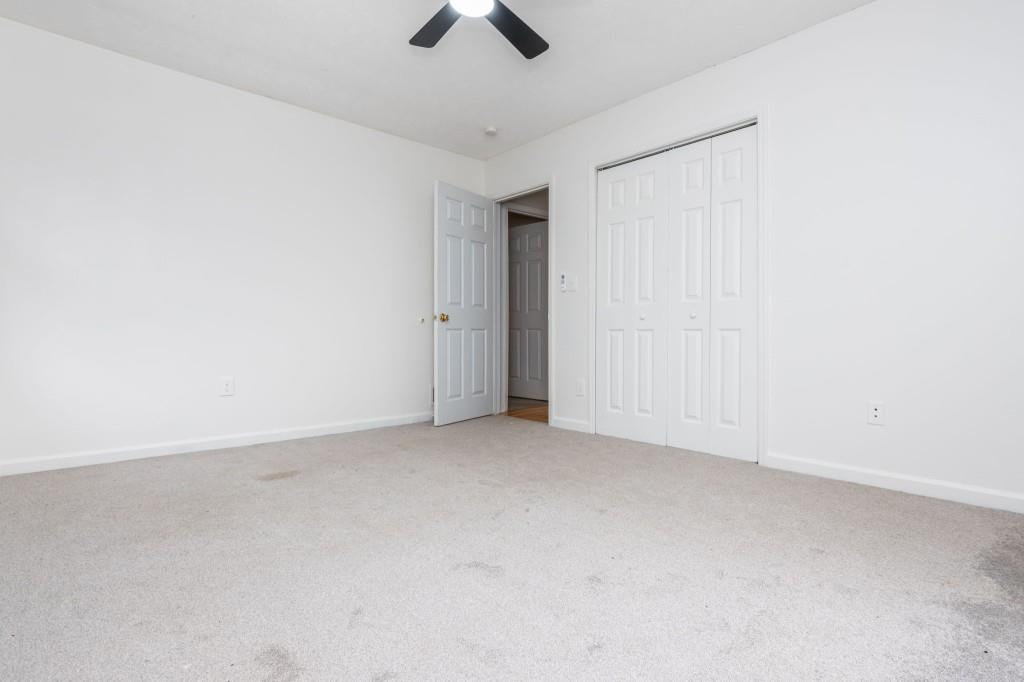 4043 Casa Loma Drive Decatur, GA 30034 - Photo 21 of 36 an empty room with ceiling fan and window