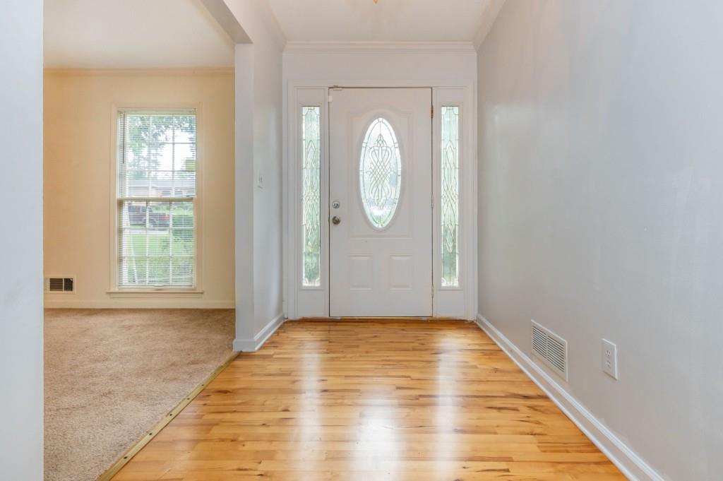 4043 Casa Loma Drive Decatur, GA 30034 - Photo 5 of 36 a view of a room with wooden floor and white walls