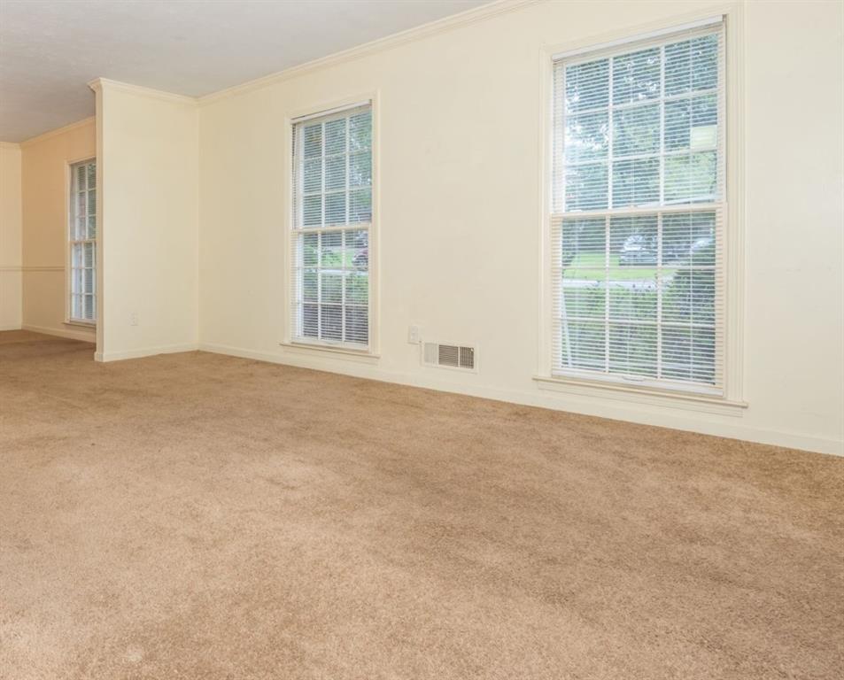 4043 Casa Loma Drive Decatur, GA 30034 - Photo 7 of 36 an empty room with windows