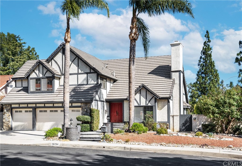 18754 Accra Street Porter Ranch, CA 91326 - Photo 1 of 1 a front view of a house