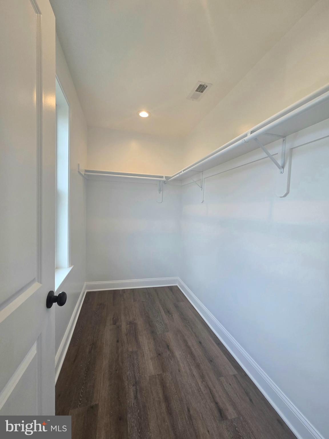 7704 Highpoint Road Clearwater Beach, MD 21226 - Photo 22 of 48 a view of a room with wooden floor