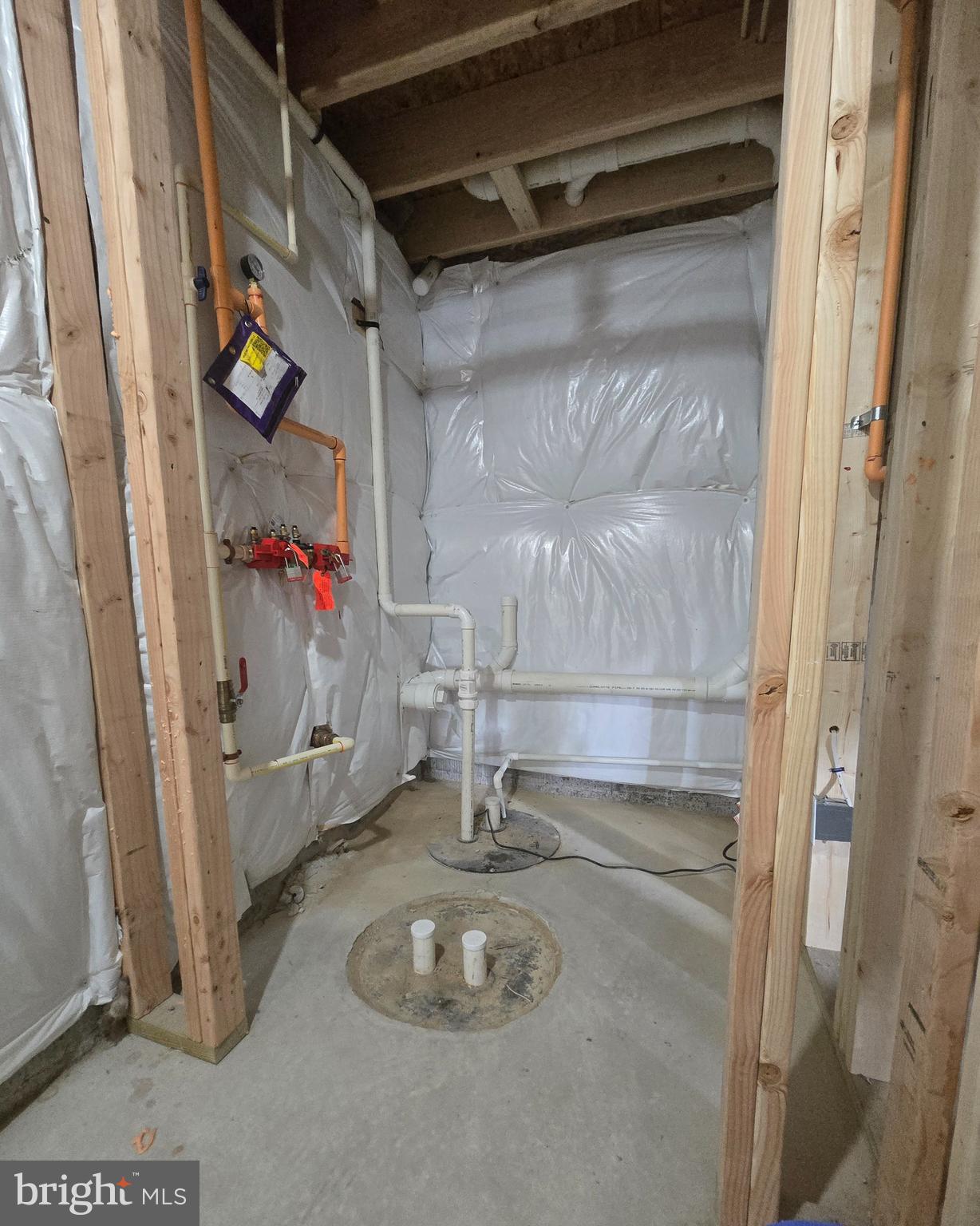 7704 Highpoint Road Clearwater Beach, MD 21226 - Photo 26 of 48 a room with water heater and a wooden door