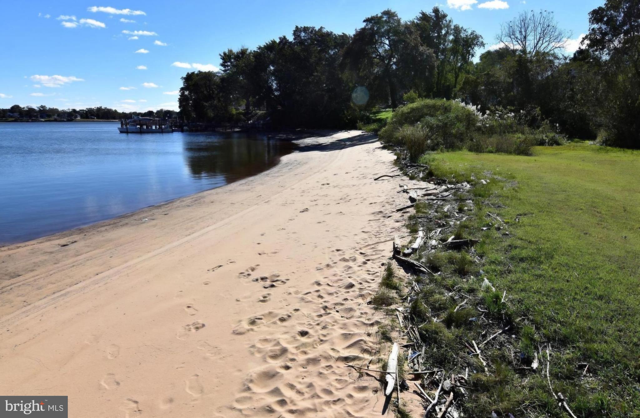 7704 Highpoint Road Clearwater Beach, MD 21226 - Photo 32 of 48 a view of a lake with a mountain
