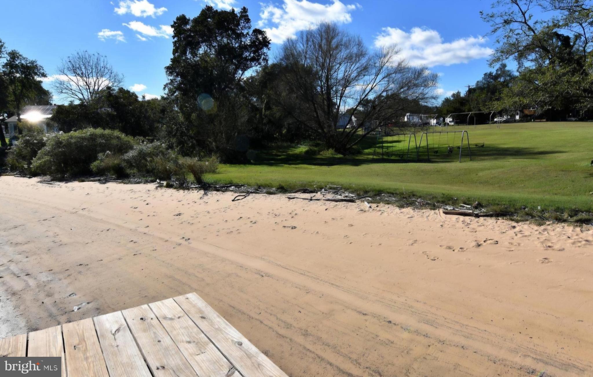 7704 Highpoint Road Clearwater Beach, MD 21226 - Photo 34 of 48 a view of a yard with a house