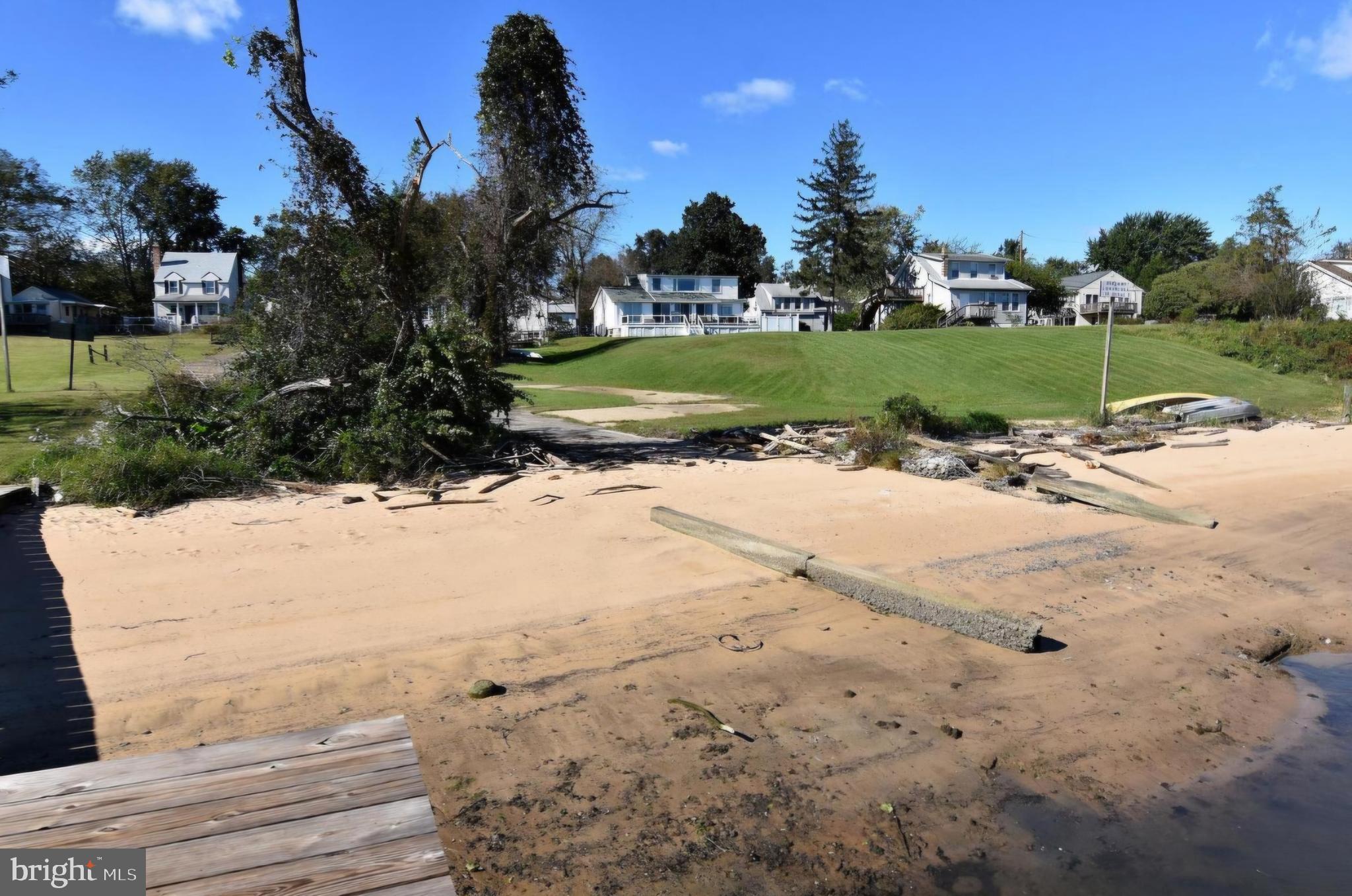 7704 Highpoint Road Clearwater Beach, MD 21226 - Photo 35 of 48 a view of a road with a yard