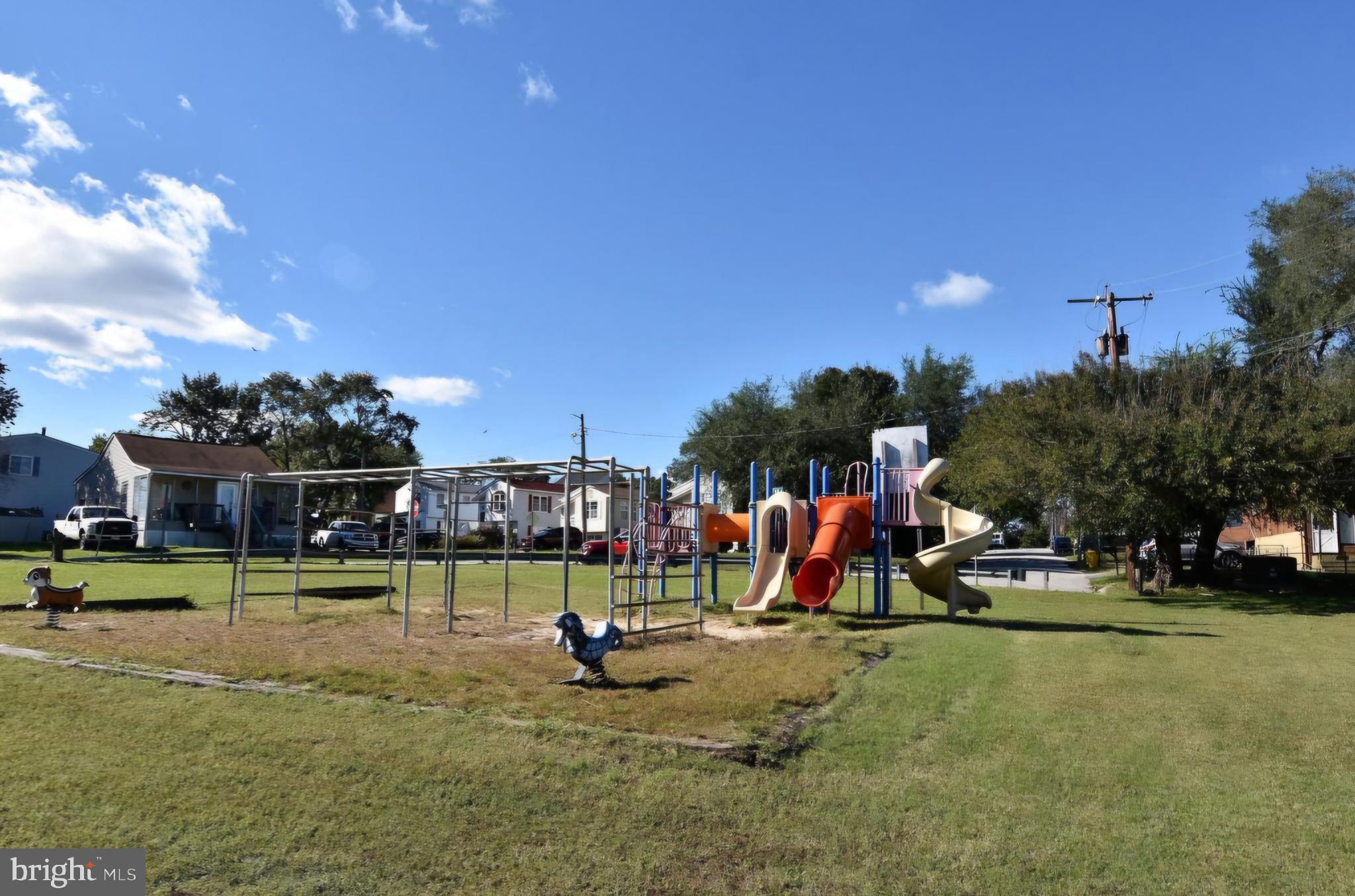 7704 Highpoint Road Clearwater Beach, MD 21226 - Photo 46 of 48 a view of a park with swings