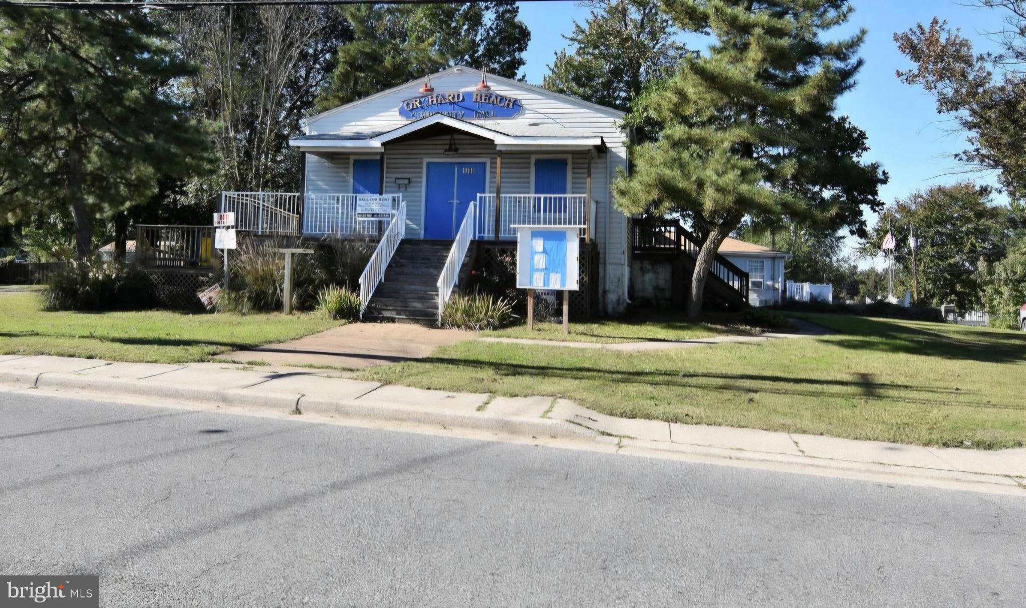 7704 Highpoint Road Clearwater Beach, MD 21226 - Photo 47 of 48 a view of a house with a yard and large trees
