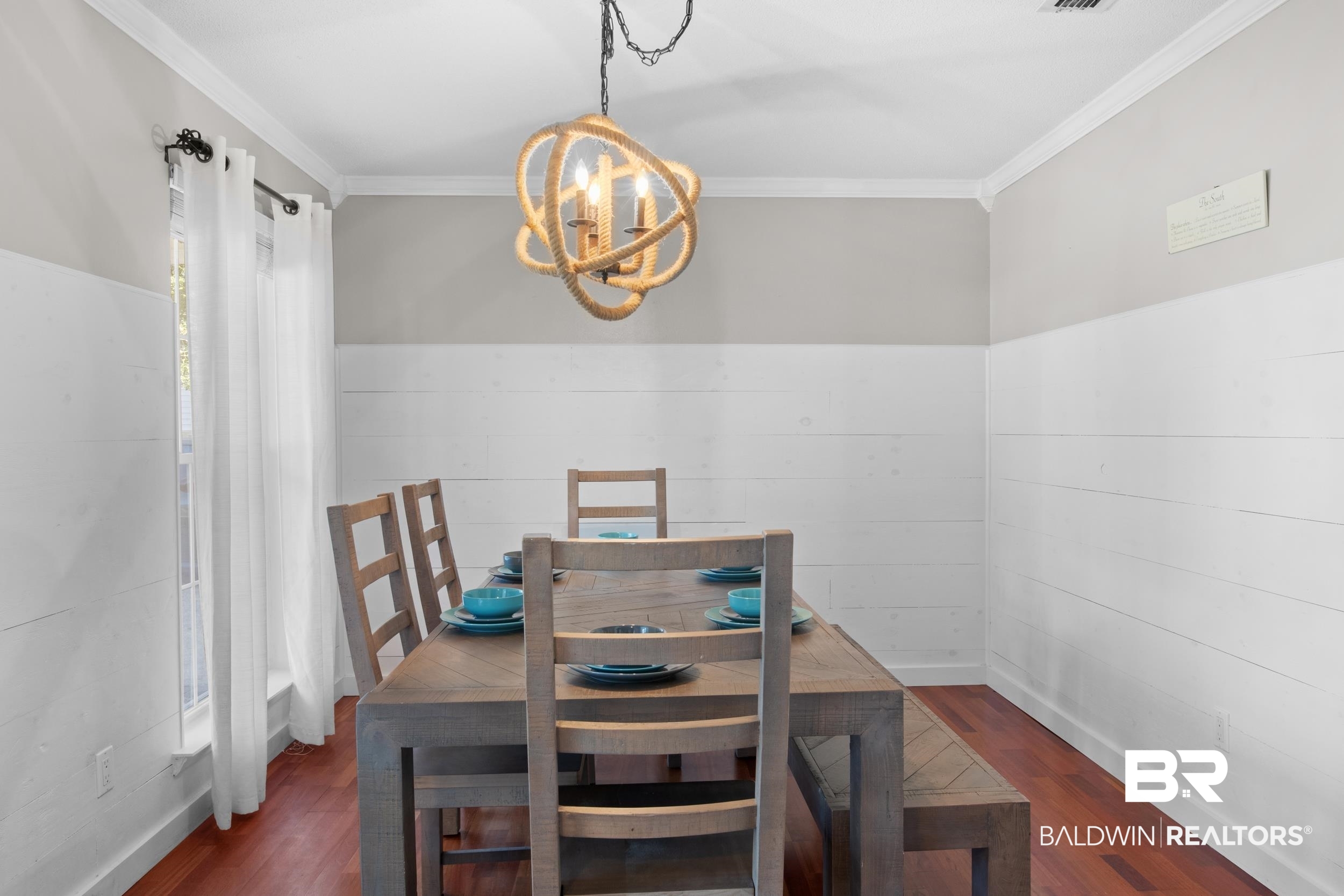 131 Marikesh Drive Daphne, AL 36526 - Photo 12 of 29 Dining room featuring crown molding, dark hardwood / wood-style floors, and a chandelier
