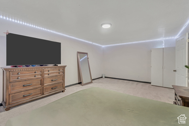 1225 North 1380th Street West Mapleton, UT 84664 - Photo 12 of 18 Bedroom featuring light carpet and baseboards
