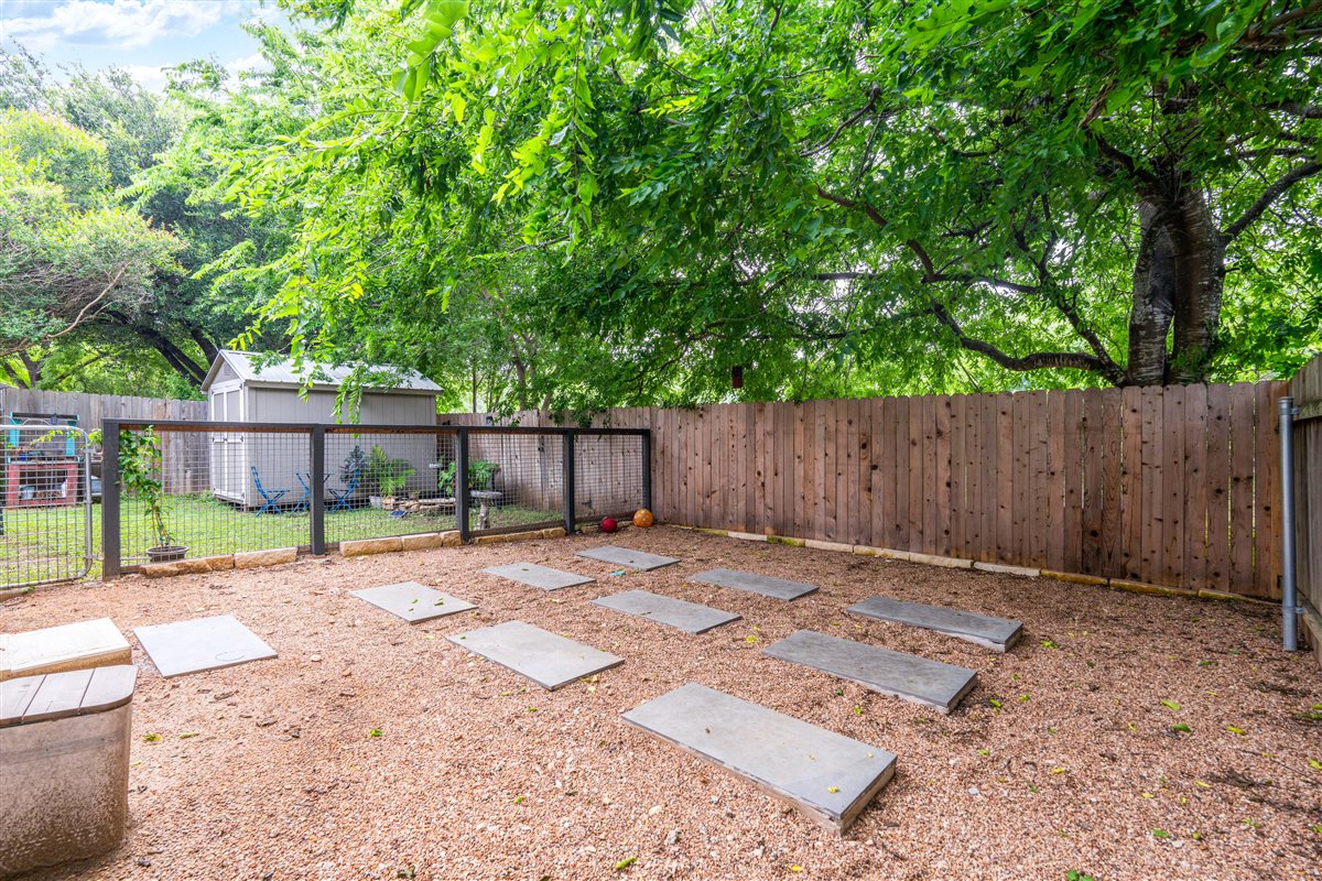 2147 Jasmine Path Round Rock, TX 78664 - Photo 34 of 36 An established tree canopy creates a naturally shaded, peaceful outdoor retreat right in your own backyard.