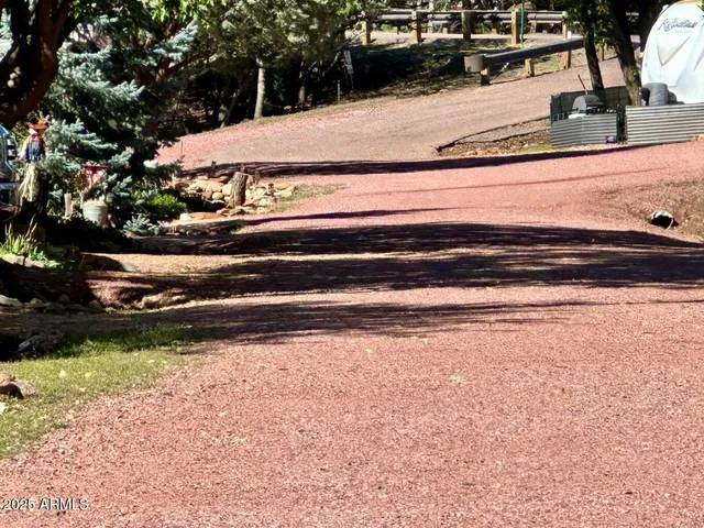 a view of a backyard of the house