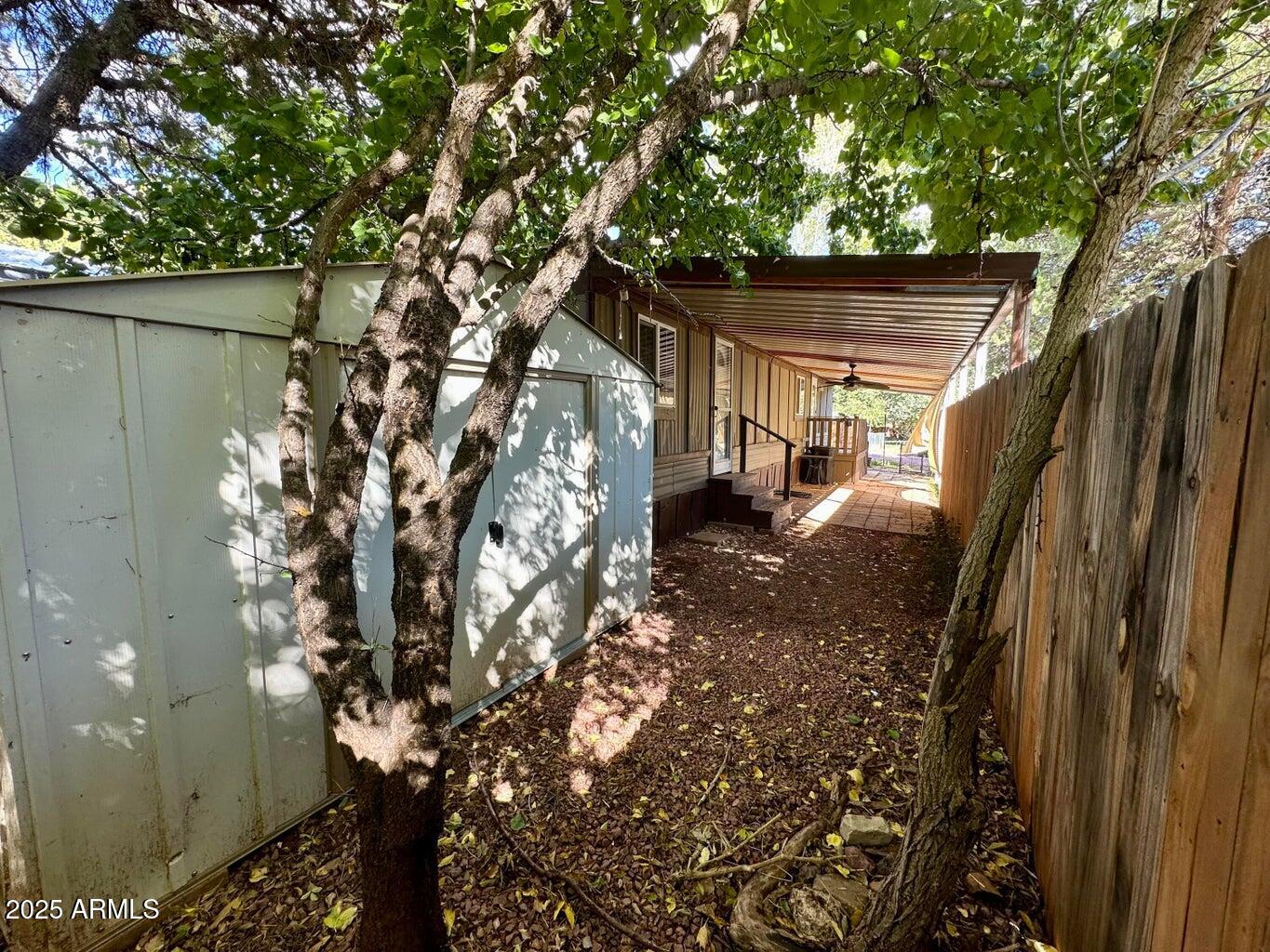 4230 North Az Highway Pine, AZ 85544 - Photo 9 of 15 a backyard of a house with lots of green space