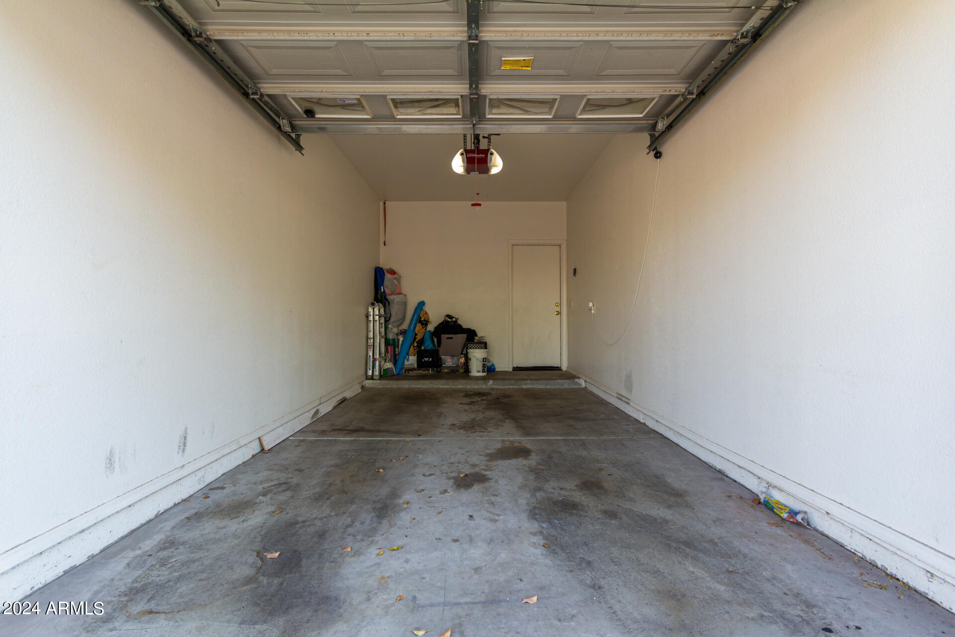 1222 West Baseline Road, Unit 240 Tempe, AZ 85283 - Photo 25 of 36 a view of a hallway with a hanging chair