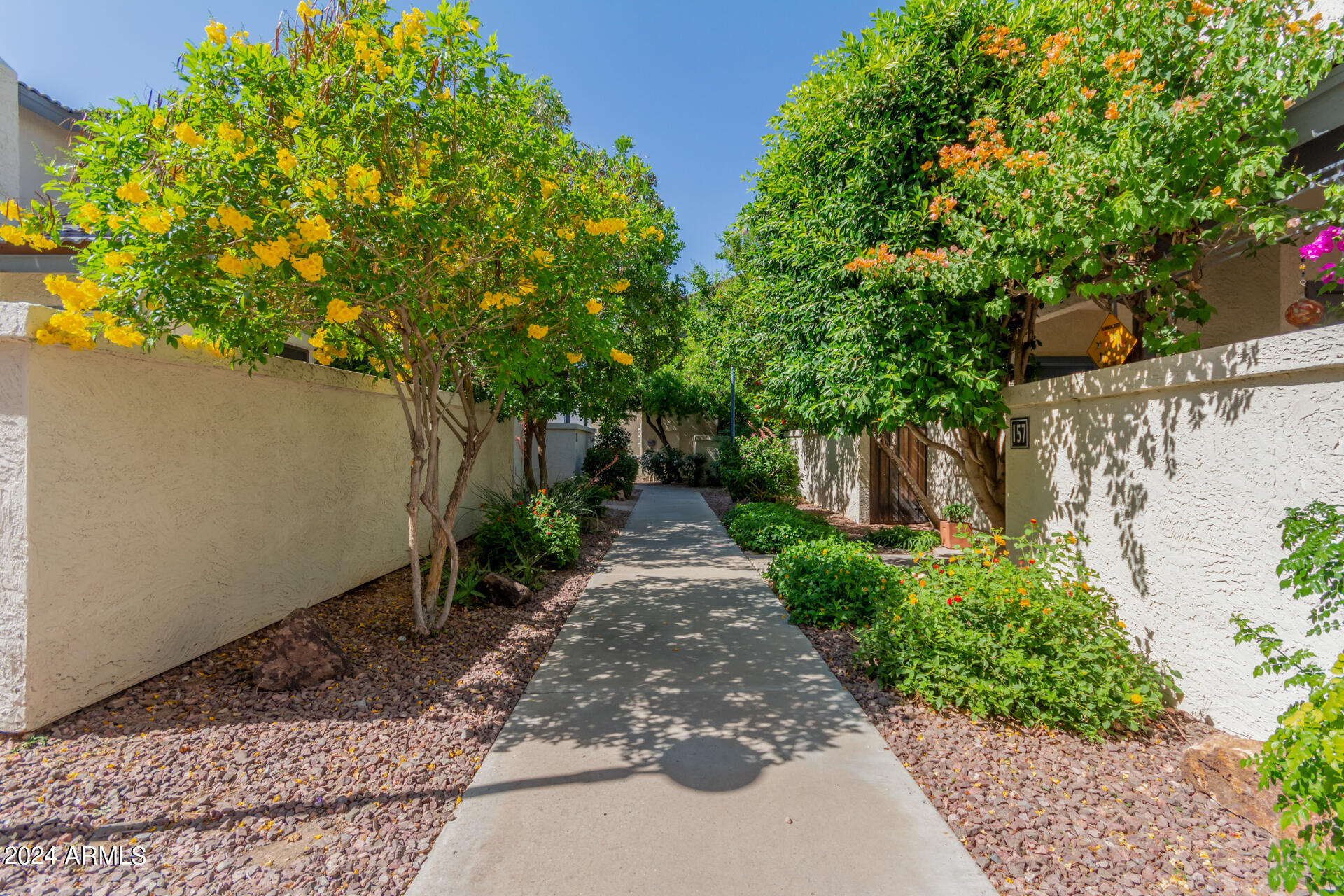 1222 West Baseline Road, Unit 240 Tempe, AZ 85283 - Photo 28 of 36 a view of a pathway of a yard