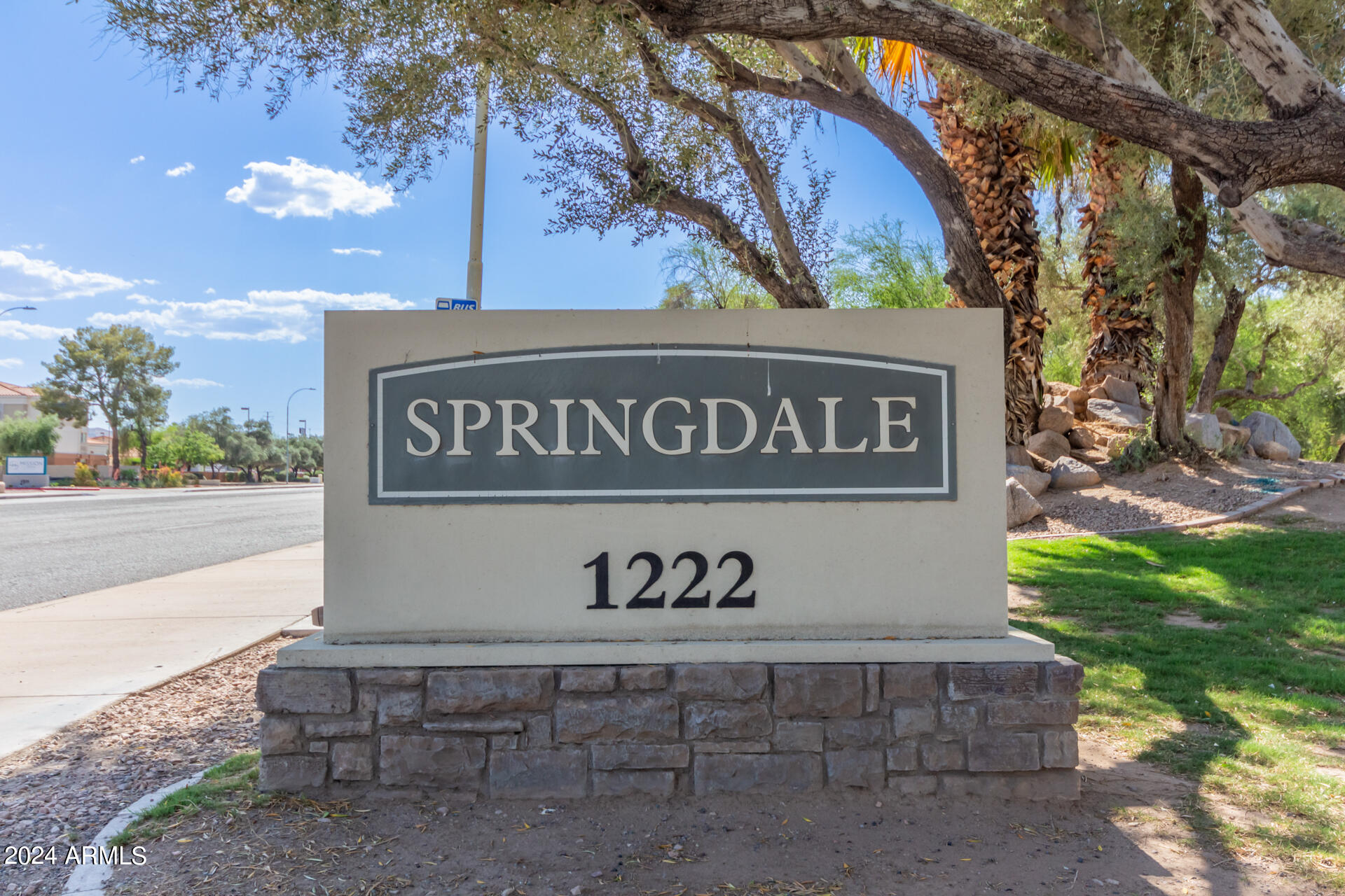 1222 West Baseline Road, Unit 240 Tempe, AZ 85283 - Photo 34 of 36 a sign broad on the side of the road