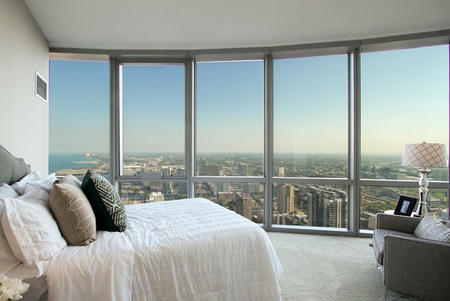 1211 South Prairie Avenue, Unit 5202 Chicago, IL 60605 - Photo 12 of 22 a view of a balcony with couches and city view