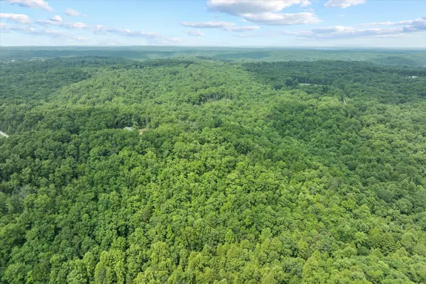 a view of a field with an outdoor space