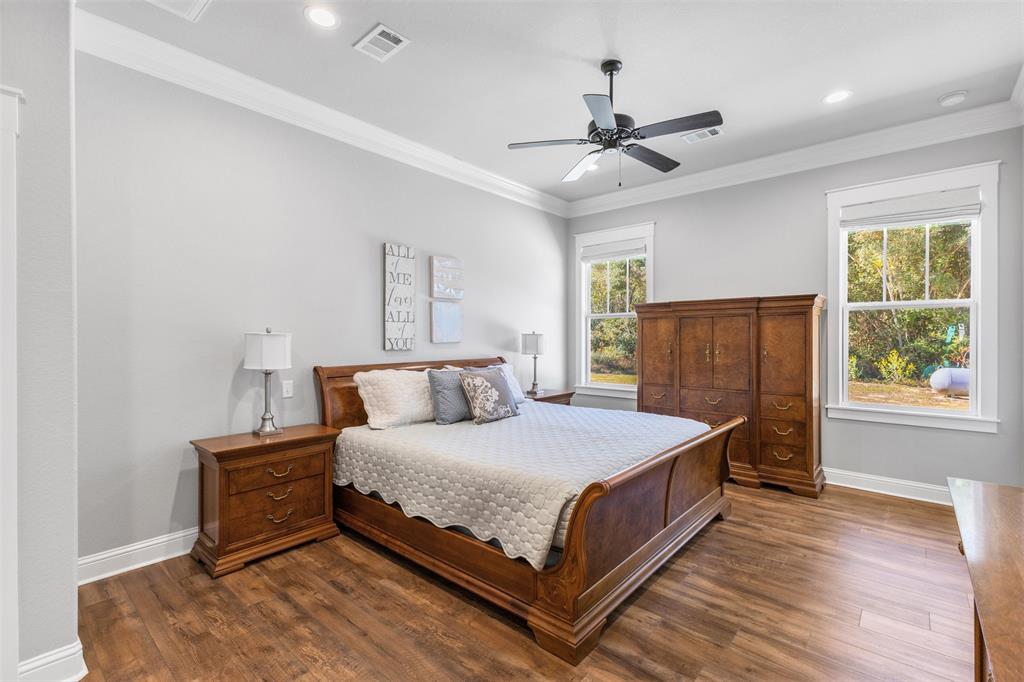 1694 Henry Prairie Road Franklin, TX 77856 - Photo 24 of 40 a bedroom with a bed and window