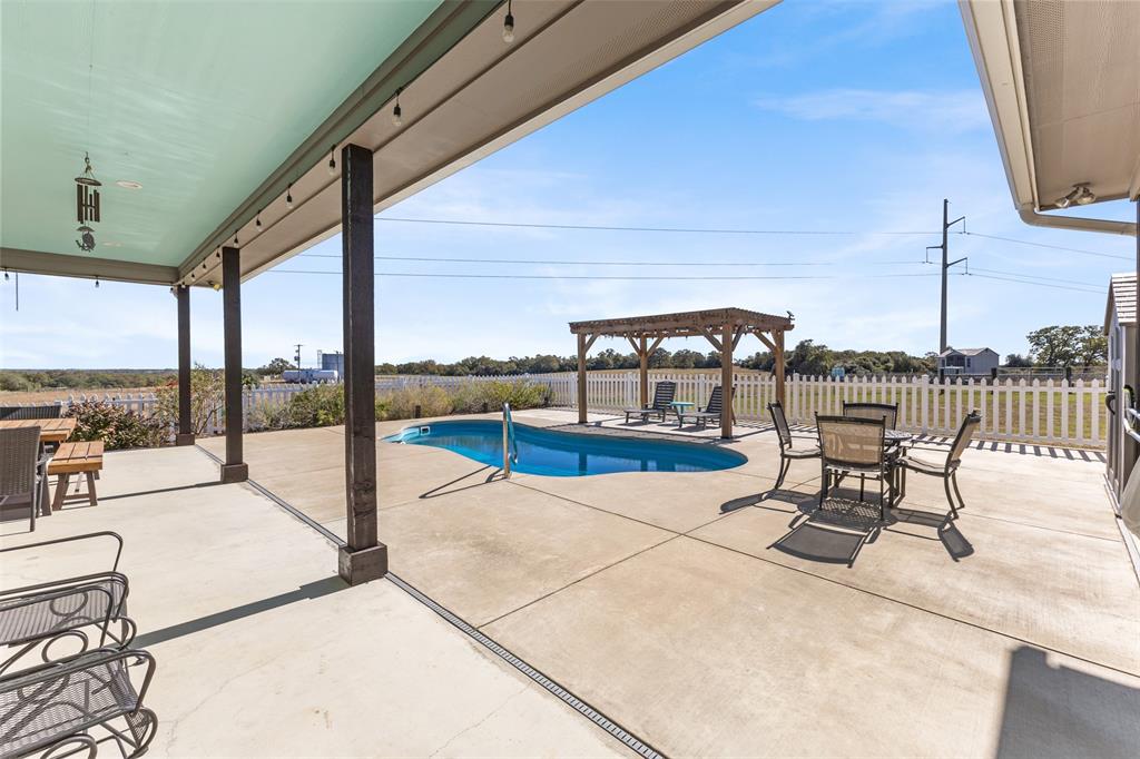 1694 Henry Prairie Road Franklin, TX 77856 - Photo 4 of 40 a building outdoor space with seating space