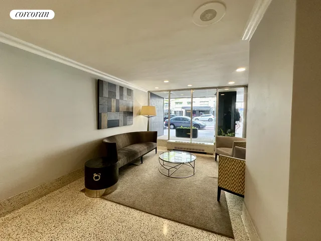 a living room with furniture and a table