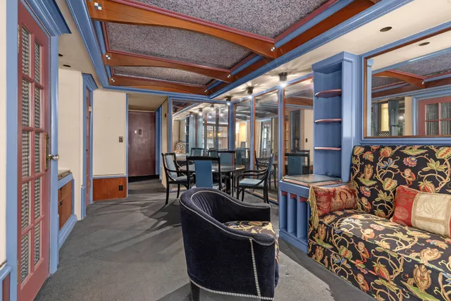 a view of a livingroom with furniture and a couch