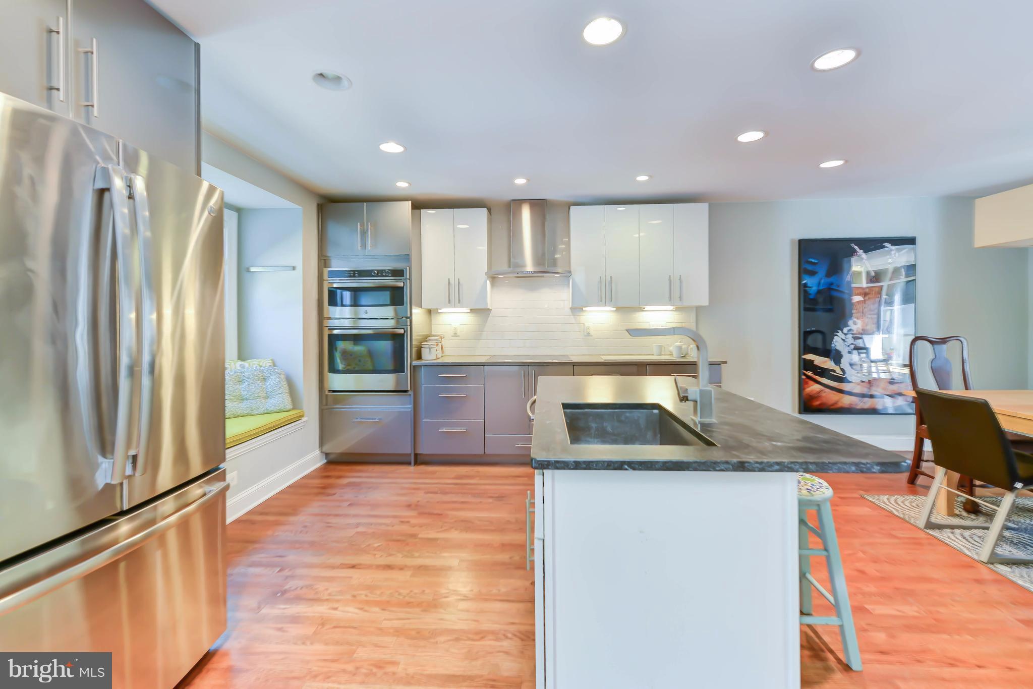 2126 Military Road Arlington, VA 22207 - Photo 13 of 29 a kitchen with stainless steel appliances granite countertop a refrigerator and a sink