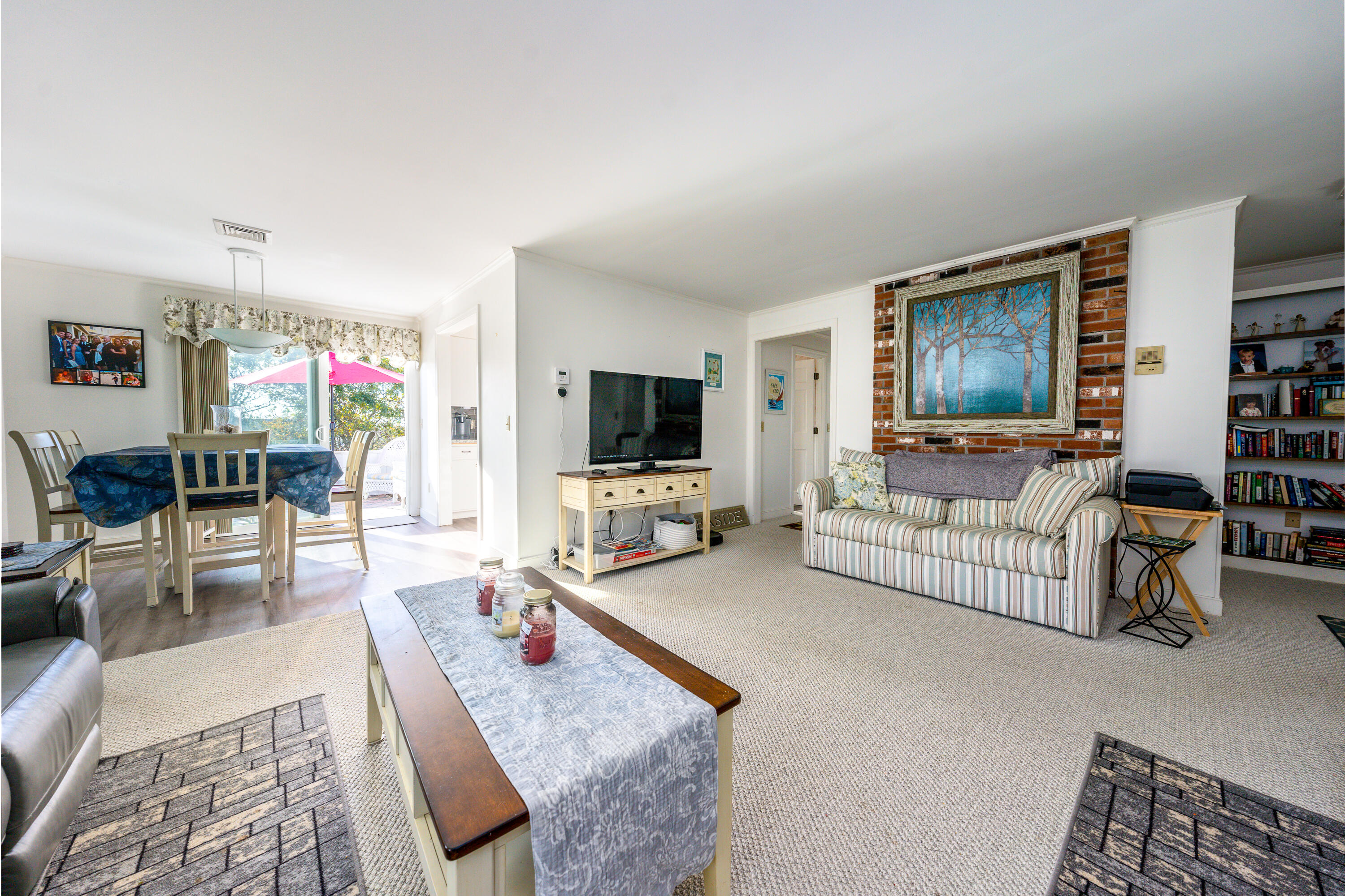 36 Belmont Road, Unit USW21 West Harwich, MA 02671 - Photo 13 of 20 a living room with furniture and a flat screen tv
