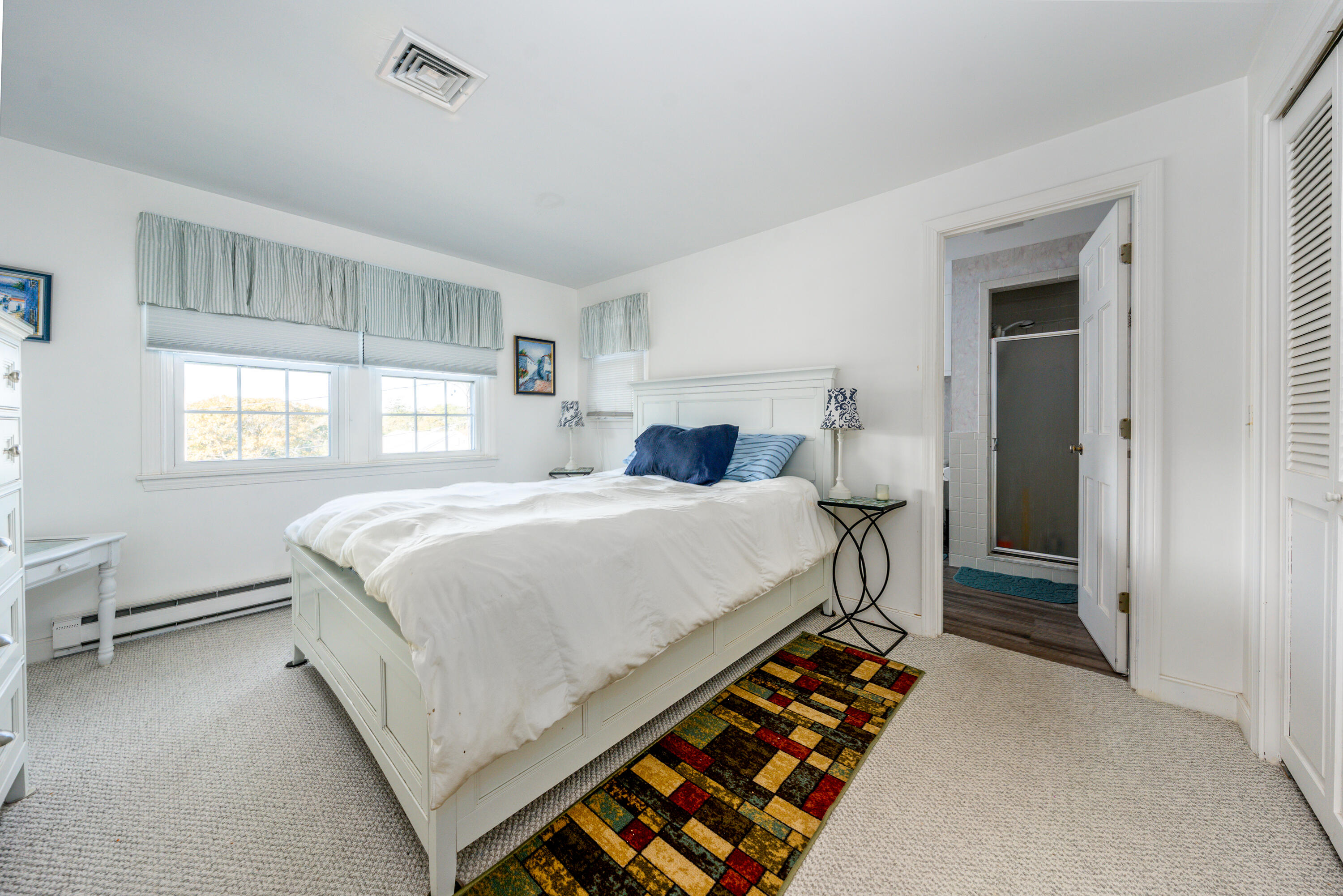 36 Belmont Road, Unit USW21 West Harwich, MA 02671 - Photo 14 of 20 a bedroom with bed and window