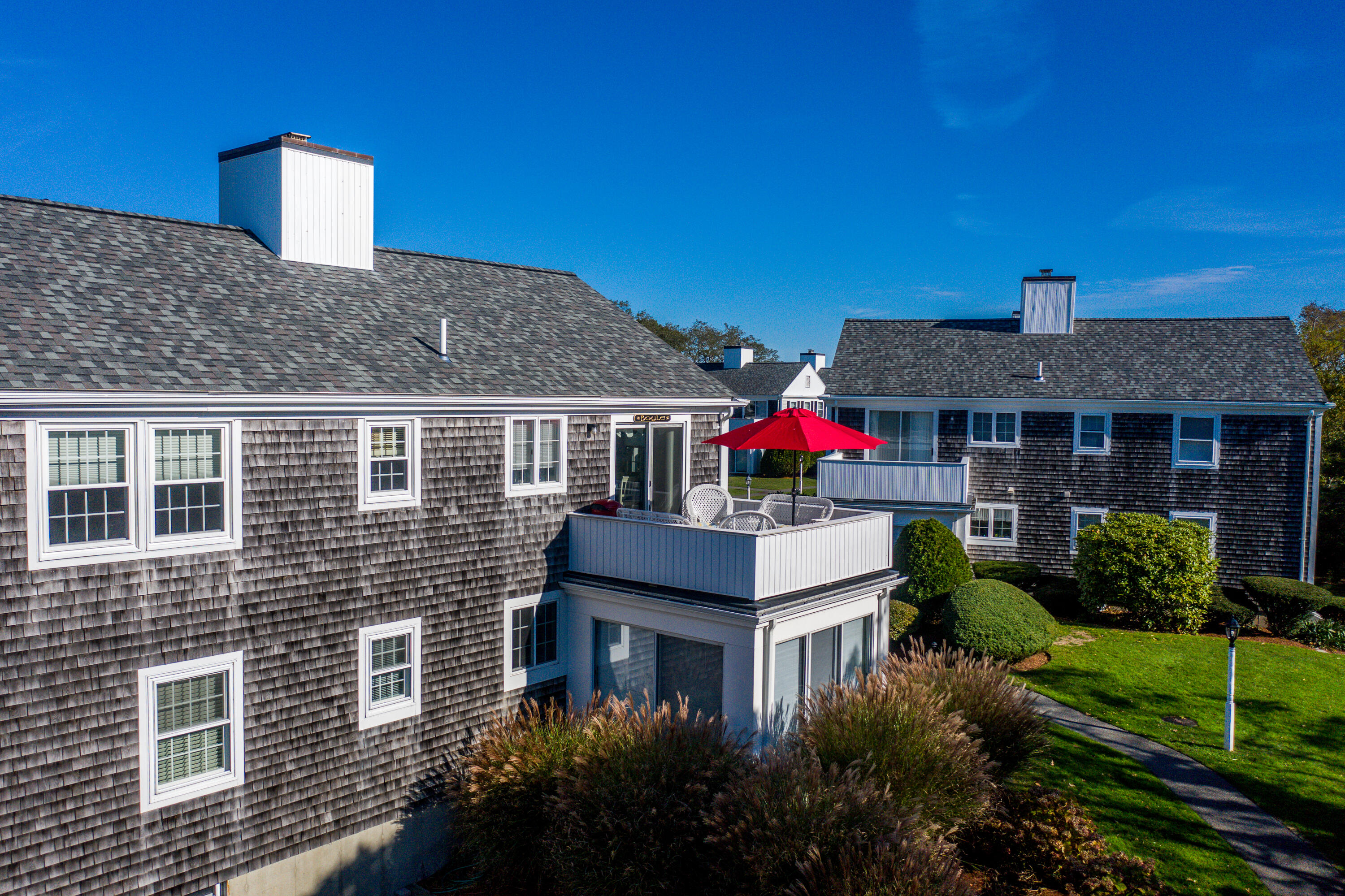 36 Belmont Road, Unit USW21 West Harwich, MA 02671 - Photo 18 of 20 a aerial view of a house with a yard