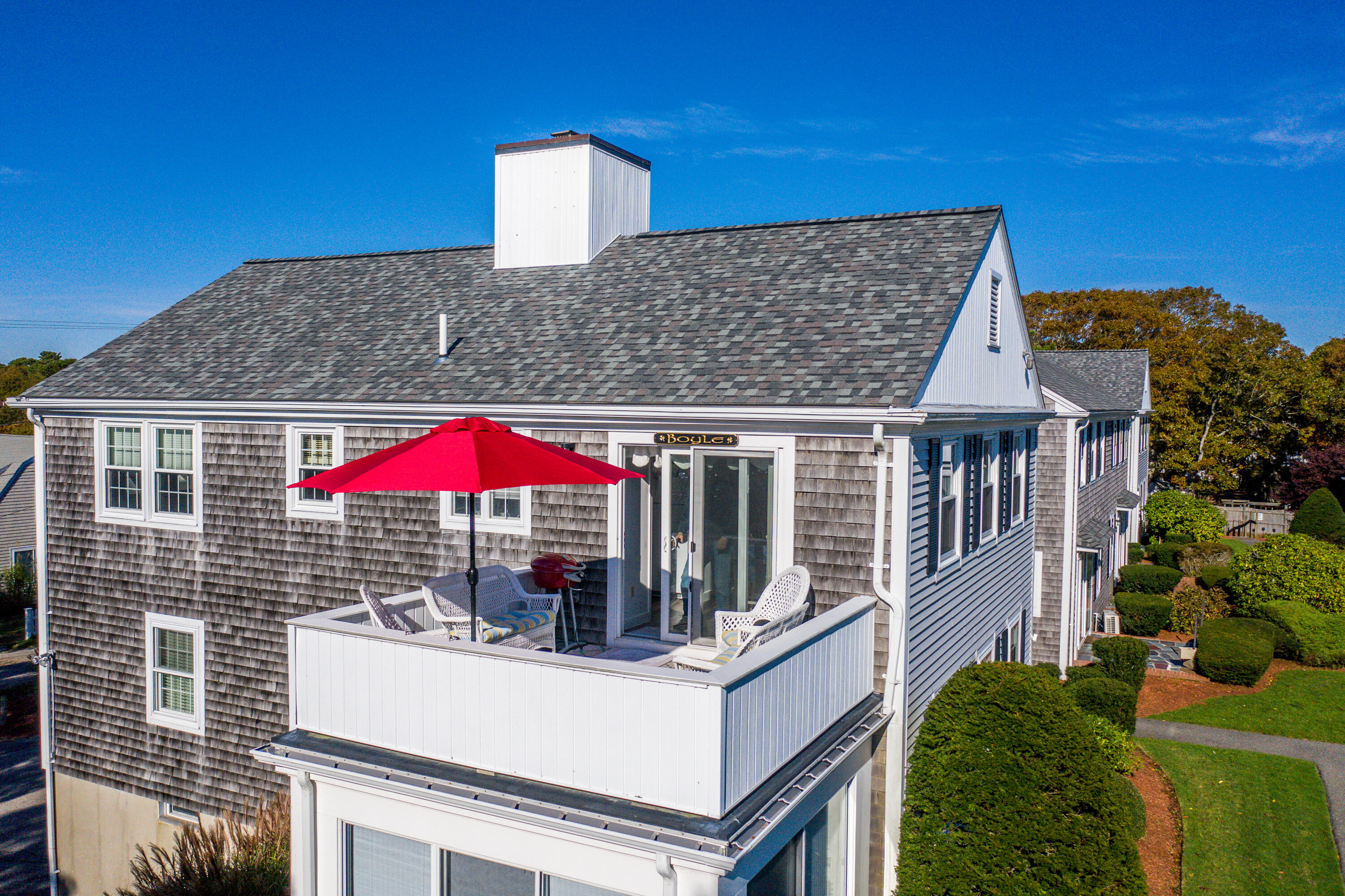 36 Belmont Road, Unit USW21 West Harwich, MA 02671 - Photo 20 of 20 a view of a house with a patio