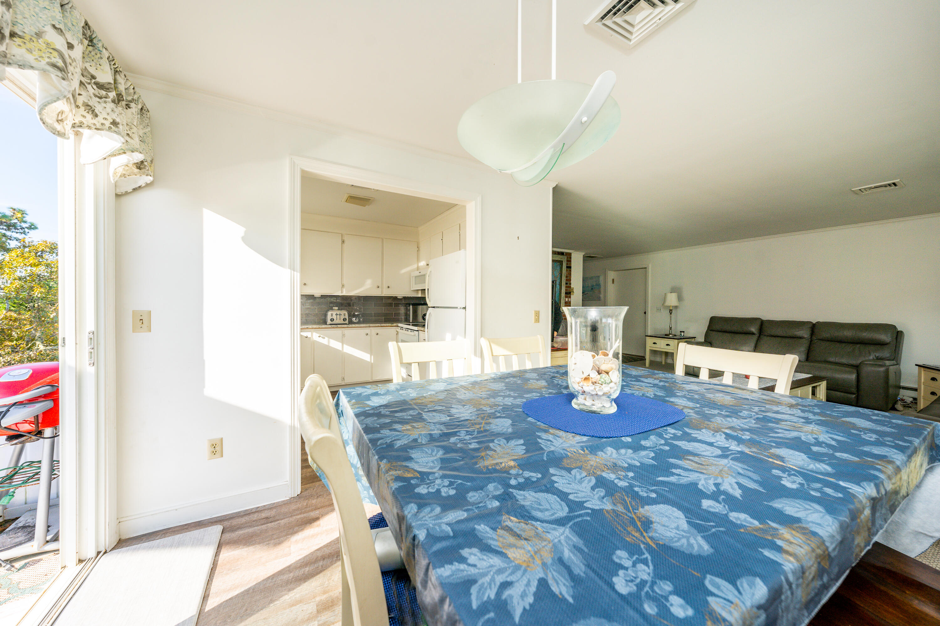 36 Belmont Road, Unit USW21 West Harwich, MA 02671 - Photo 9 of 20 a kitchen with stainless steel appliances granite countertop a stove refrigerator and cabinets