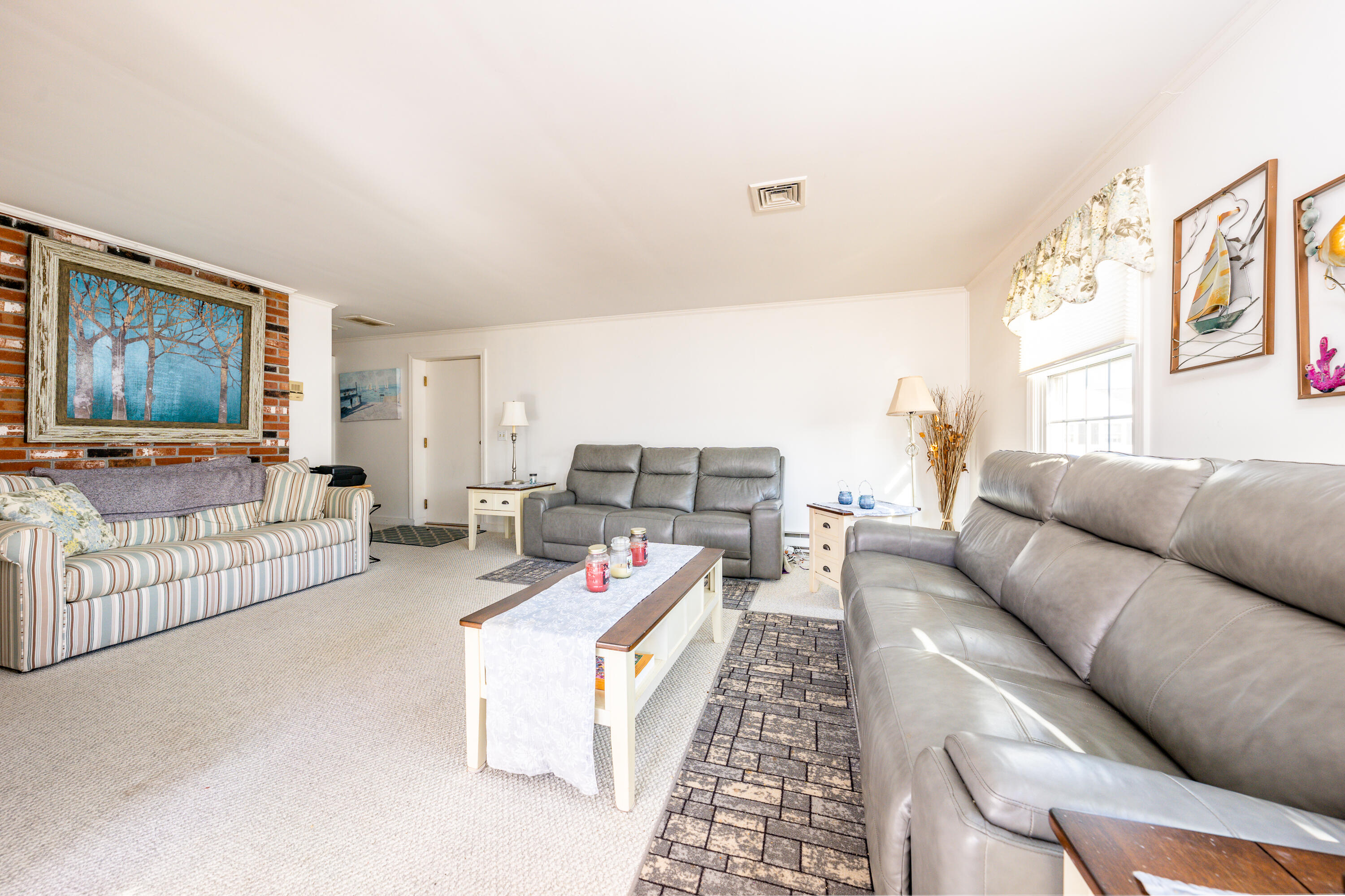 36 Belmont Road, Unit USW21 West Harwich, MA 02671 - Photo 10 of 20 a living room with furniture and a couch