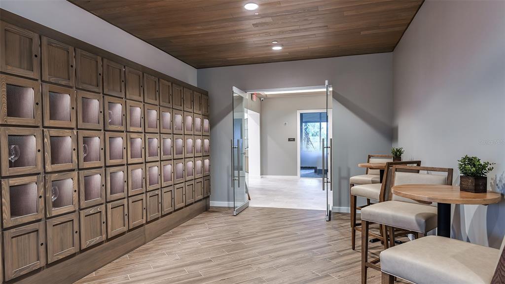 3938 Immacolata Way Wesley Chapel, FL 33543 - Photo 34 of 39 a view of a room with furniture and wooden floor