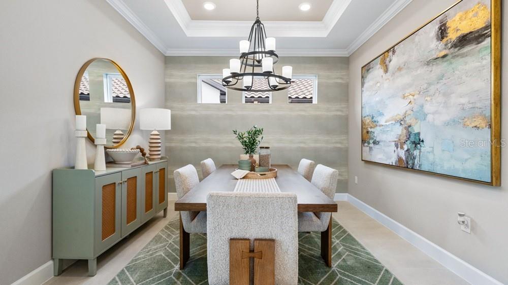 3938 Immacolata Way Wesley Chapel, FL 33543 - Photo 10 of 39 a dining room with furniture and window