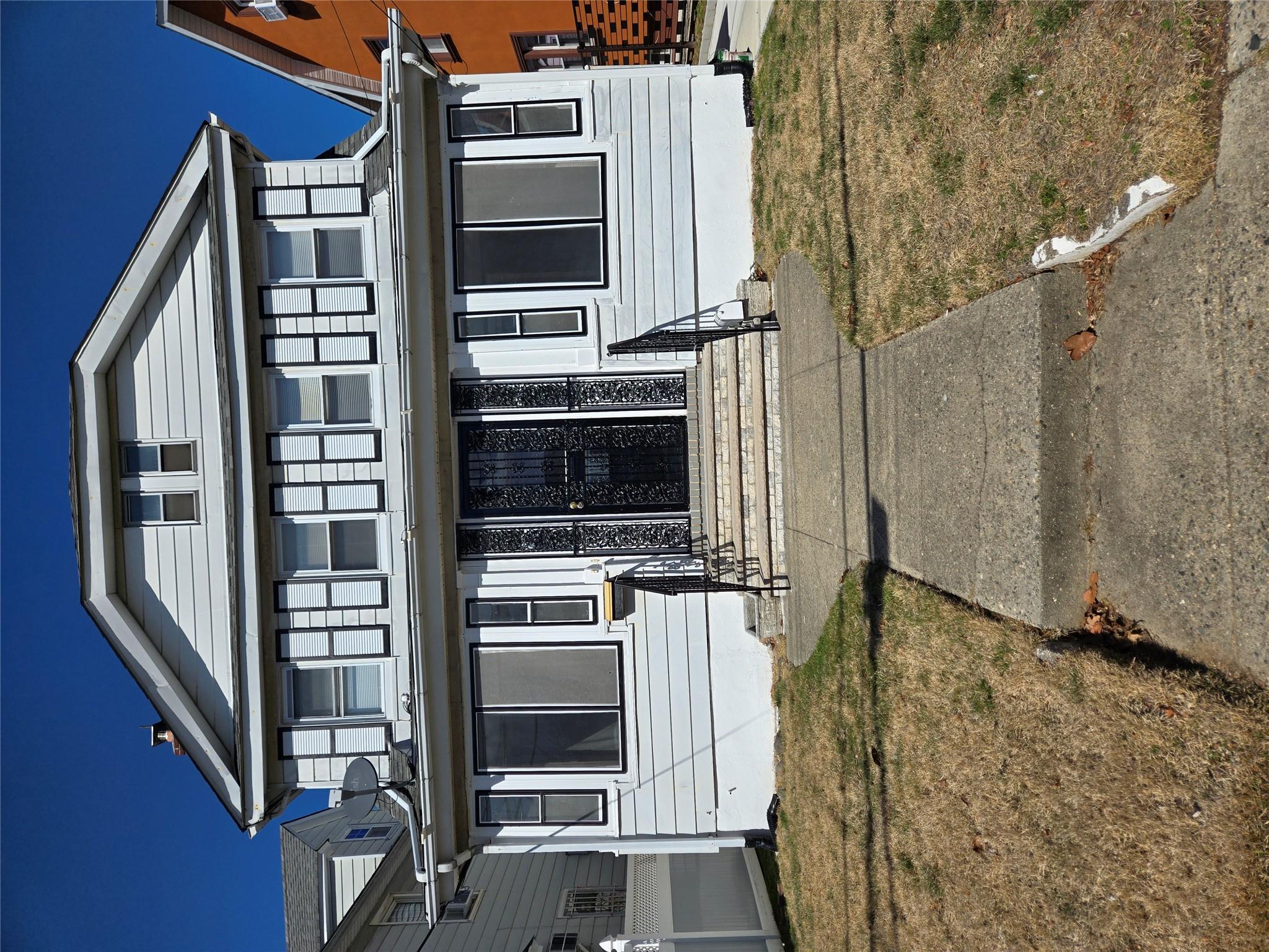 189-07 Quencer Road Queens, NY 11412 - Photo 1 of 36 a front view of a house