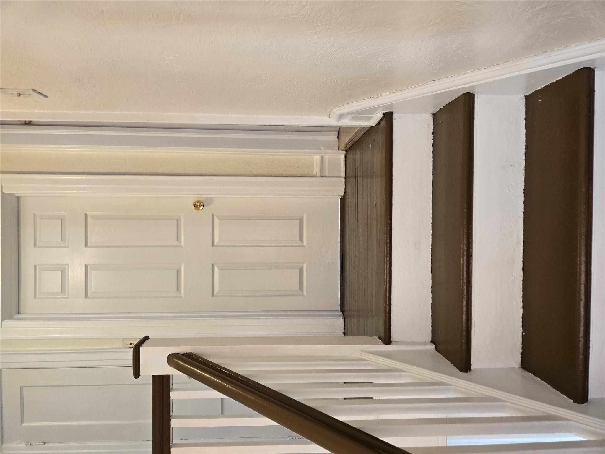 189-07 Quencer Road Queens, NY 11412 - Photo 12 of 36 a view of bedroom with wooden floor and stairs