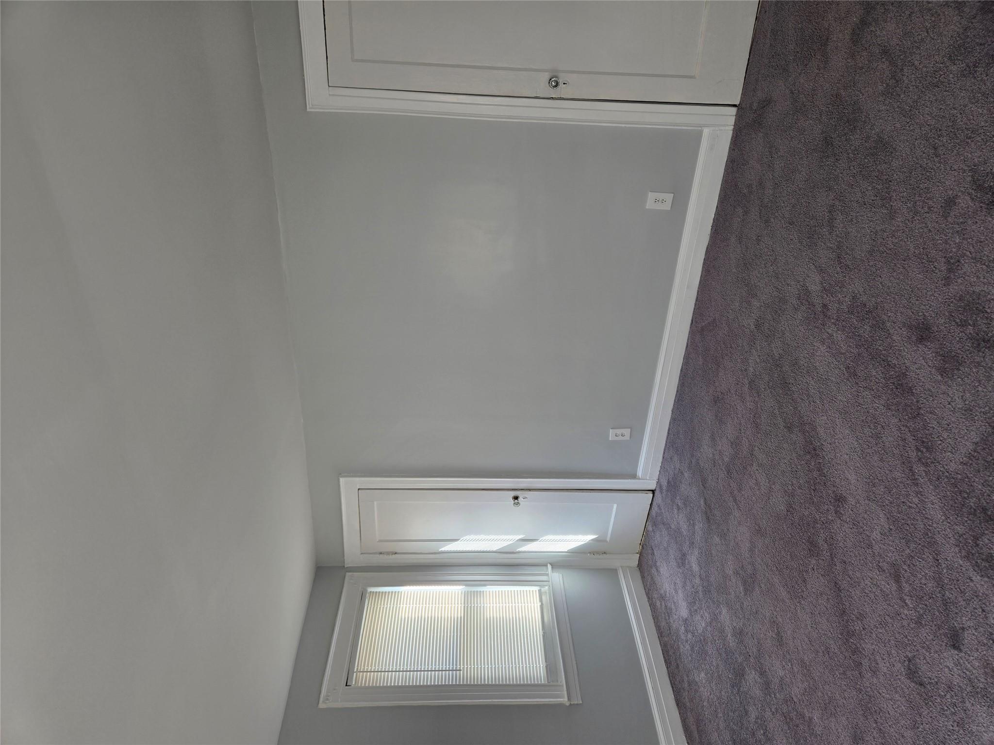 189-07 Quencer Road Queens, NY 11412 - Photo 18 of 36 a view of an empty room with window