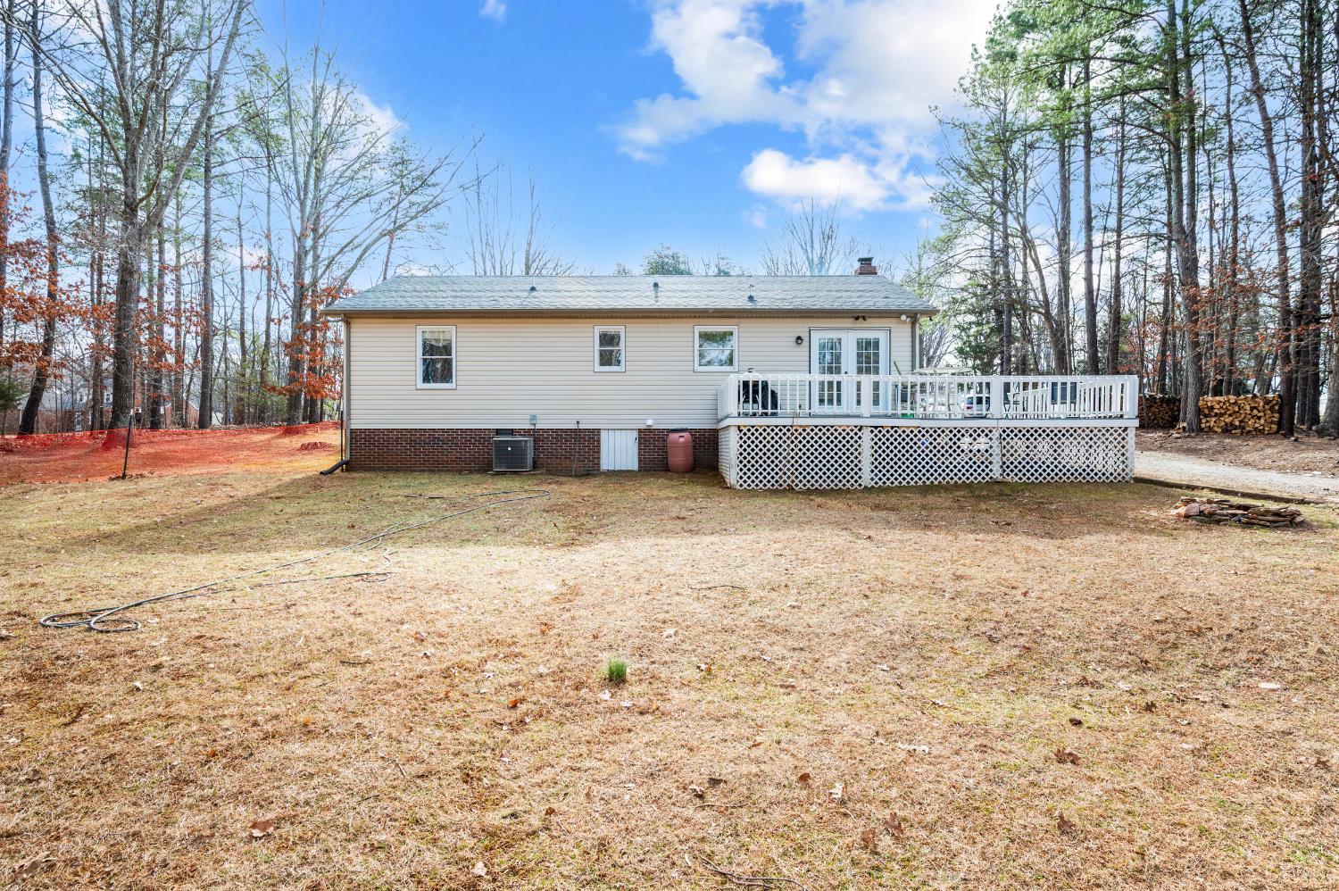 3105 Horseshoe Road Appomattox, VA 24522 - Photo 51 of 59 a view of a house with a big yard and large tree