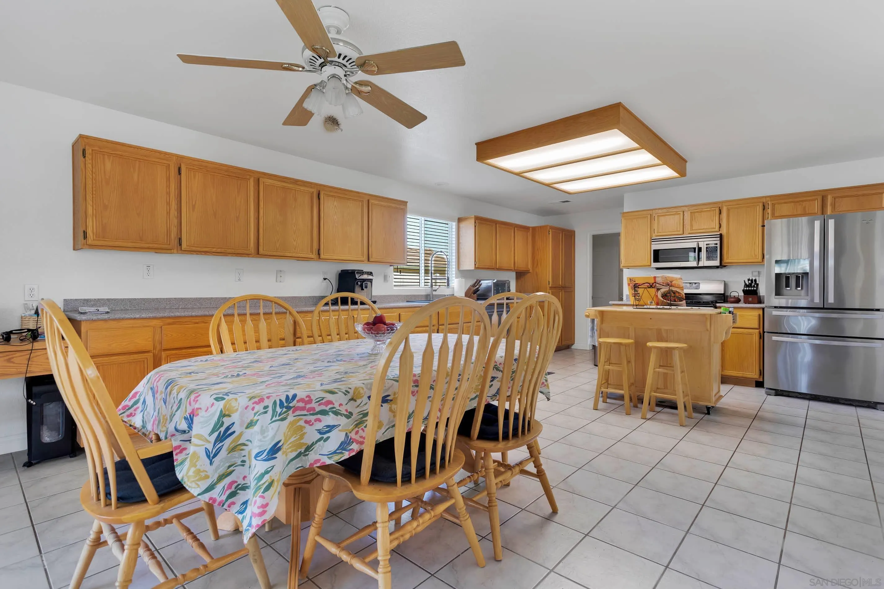 3080 Nightwind Circle Corona, CA 92882 - Photo 19 of 62 a view of a dining room with furniture
