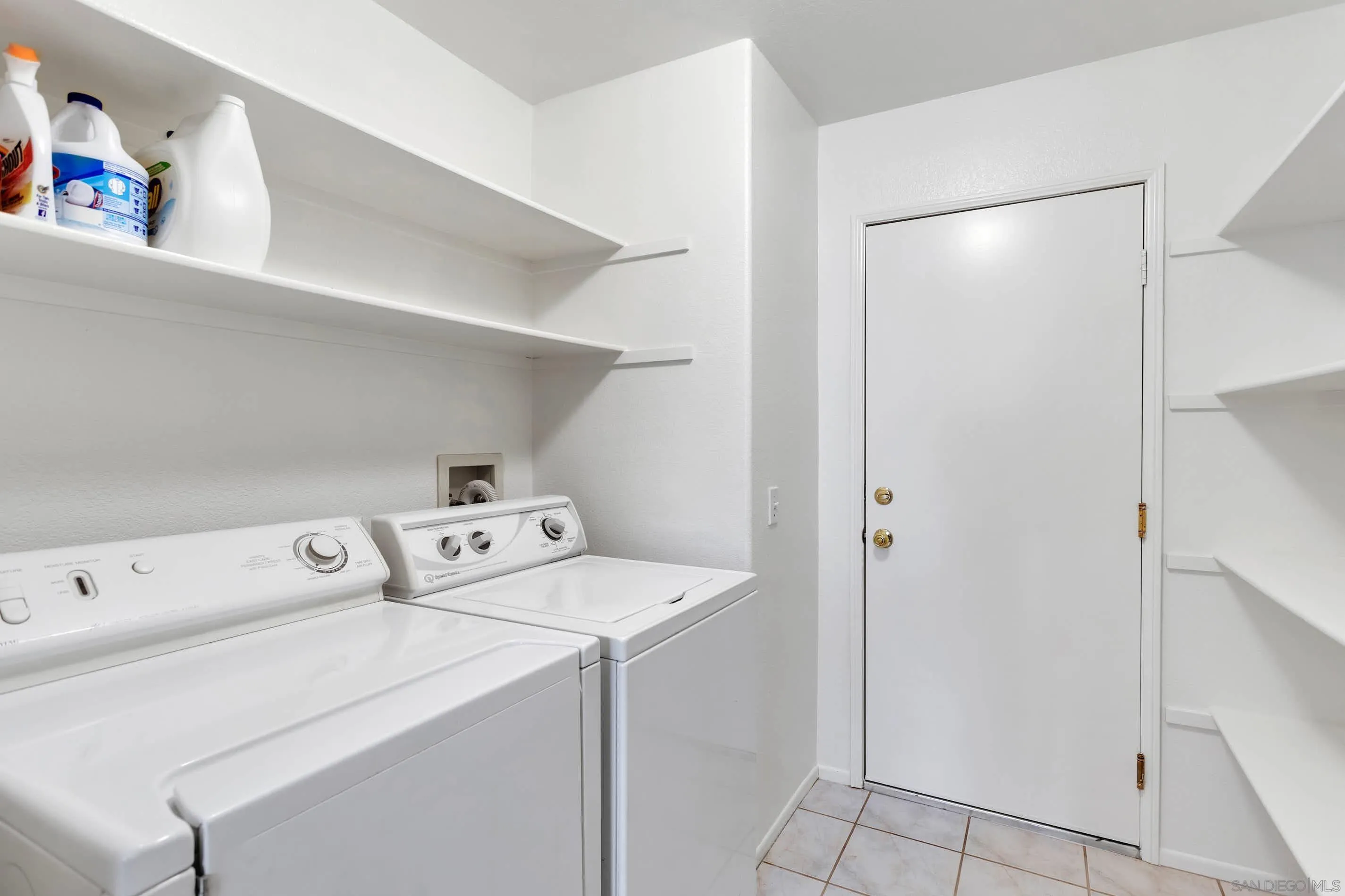 3080 Nightwind Circle Corona, CA 92882 - Photo 24 of 62 a utility room with dryer and washer