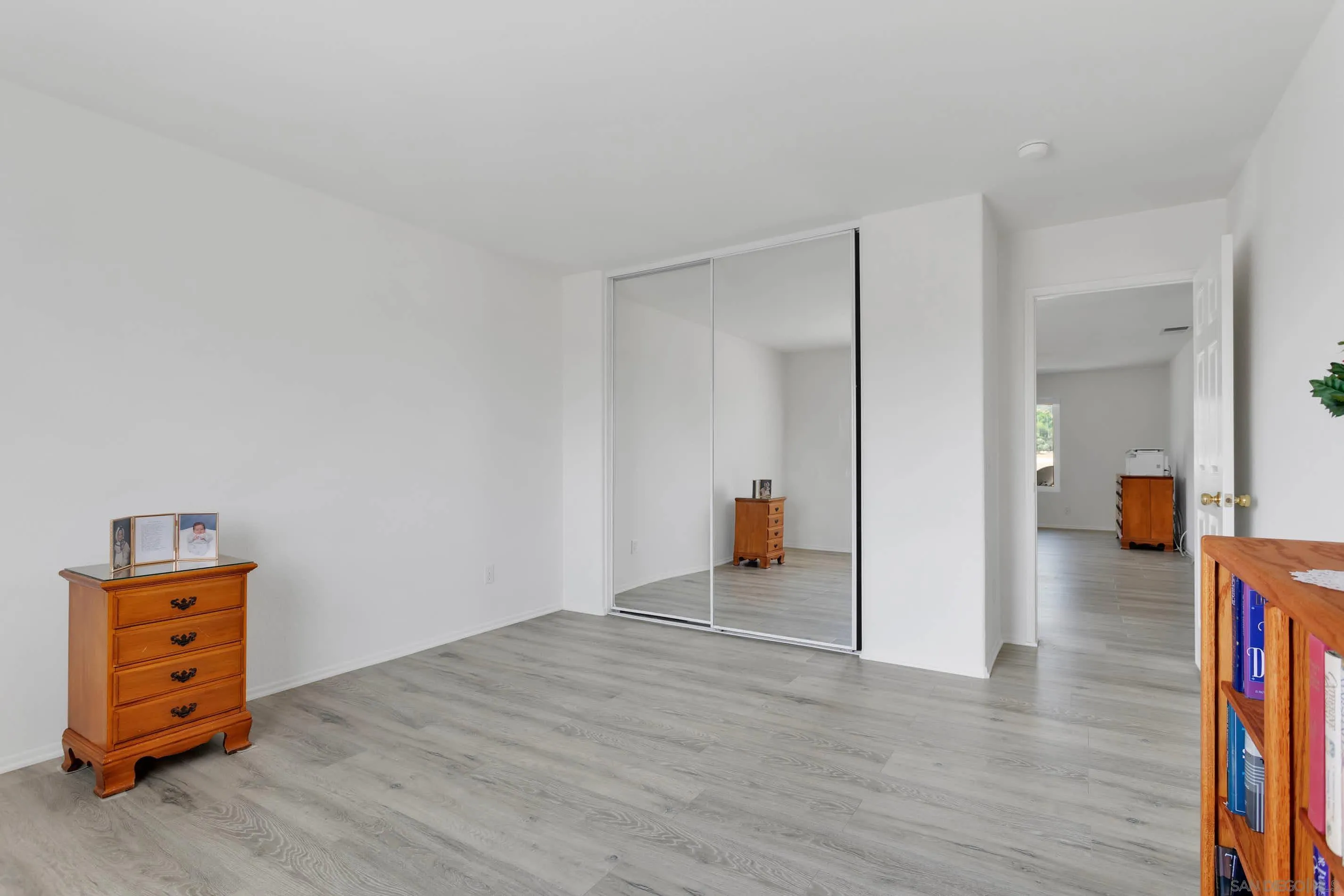 3080 Nightwind Circle Corona, CA 92882 - Photo 26 of 62 a view of a livingroom with wooden floor