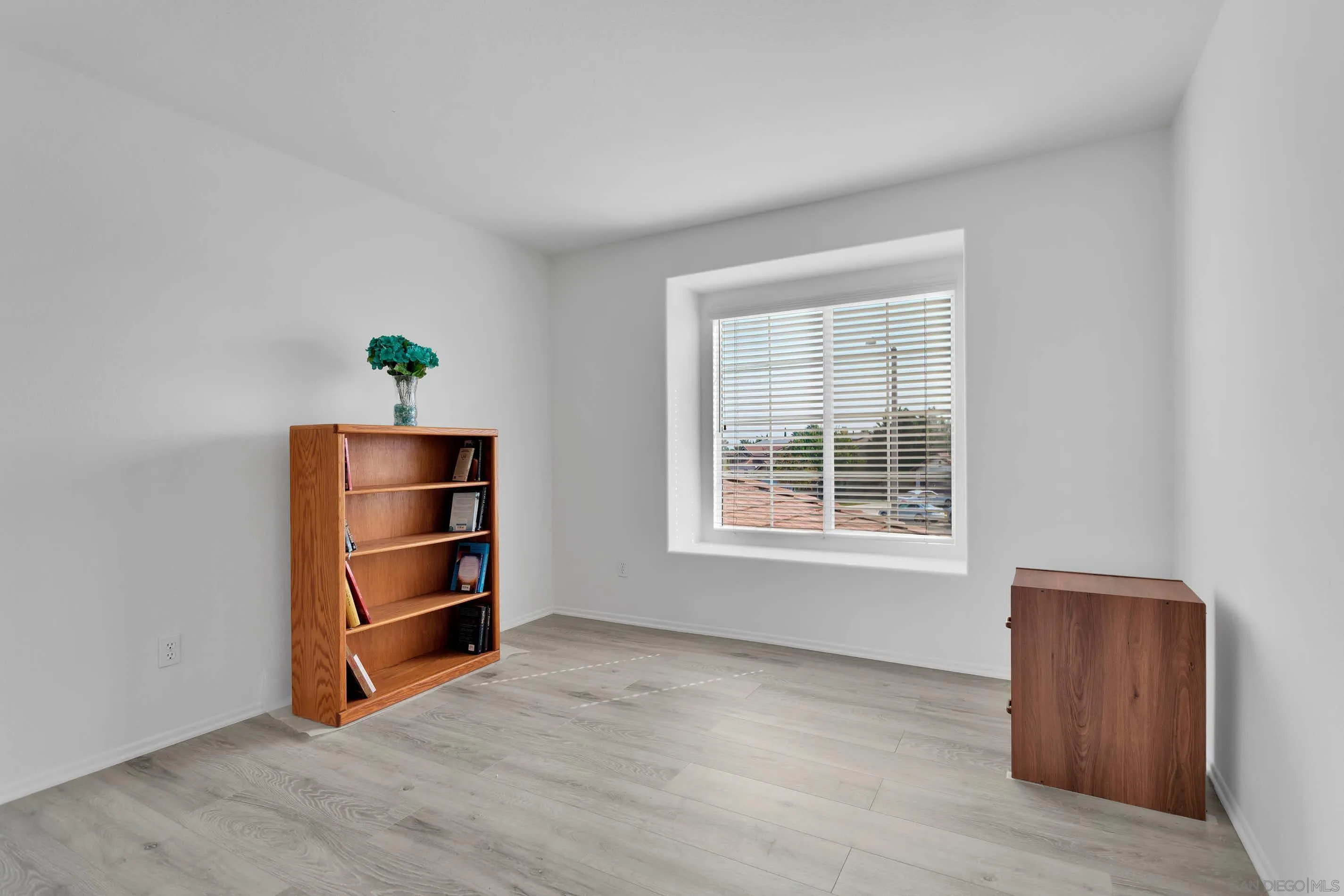 3080 Nightwind Circle Corona, CA 92882 - Photo 32 of 62 a view of room with window and cabinet