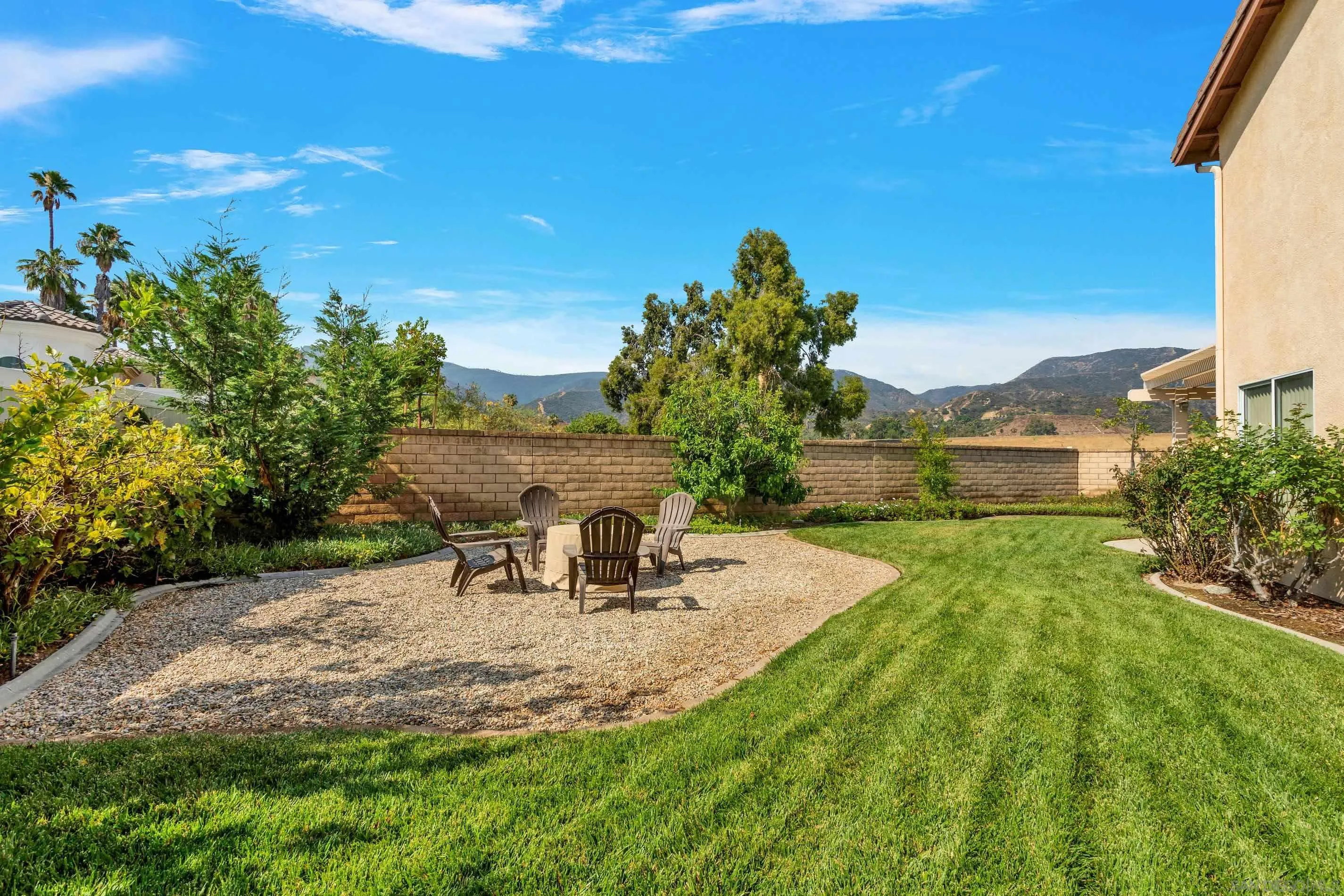3080 Nightwind Circle Corona, CA 92882 - Photo 45 of 62 a view of a backyard with sitting area