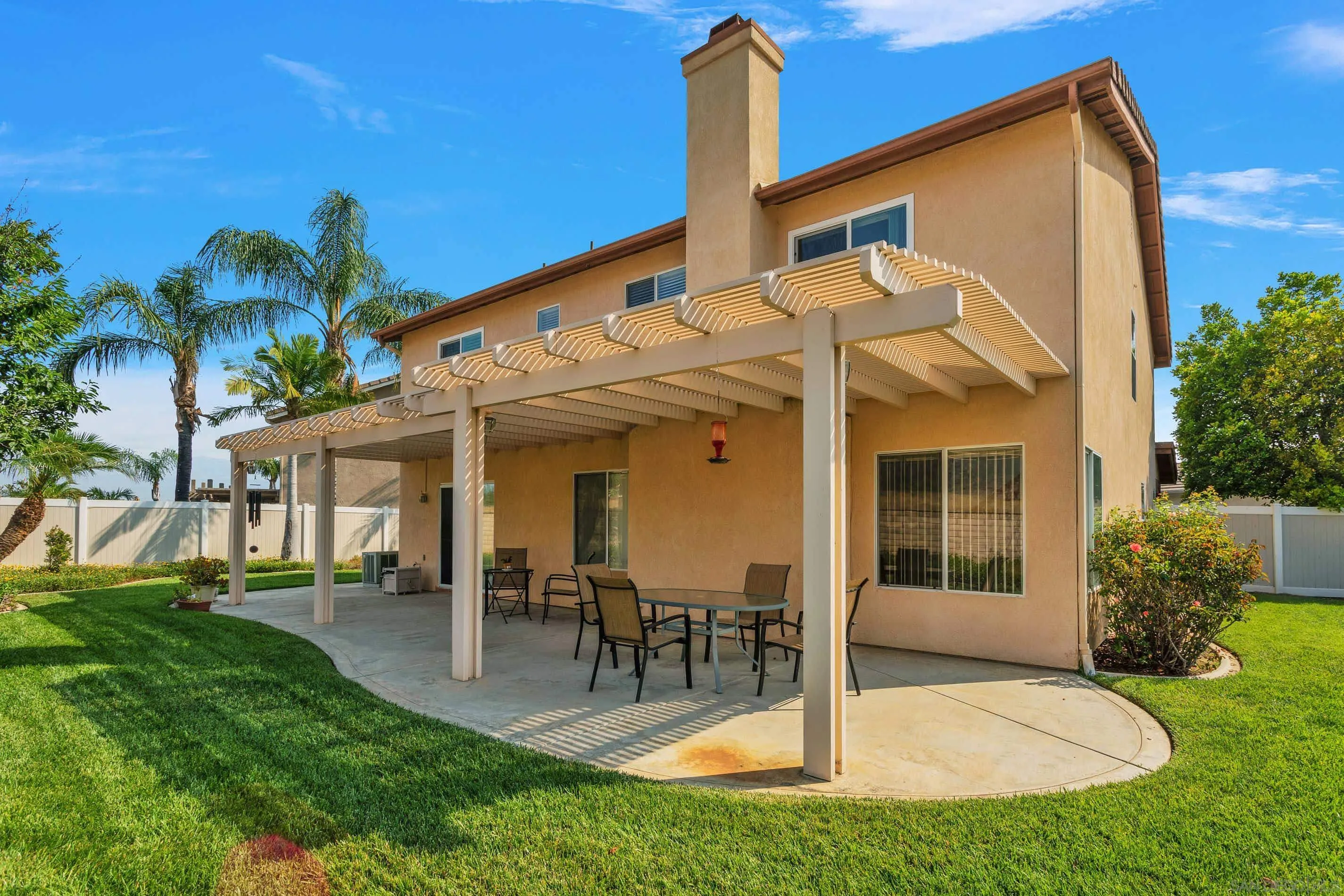 3080 Nightwind Circle Corona, CA 92882 - Photo 48 of 62 a view of a house with backyard porch and sitting area