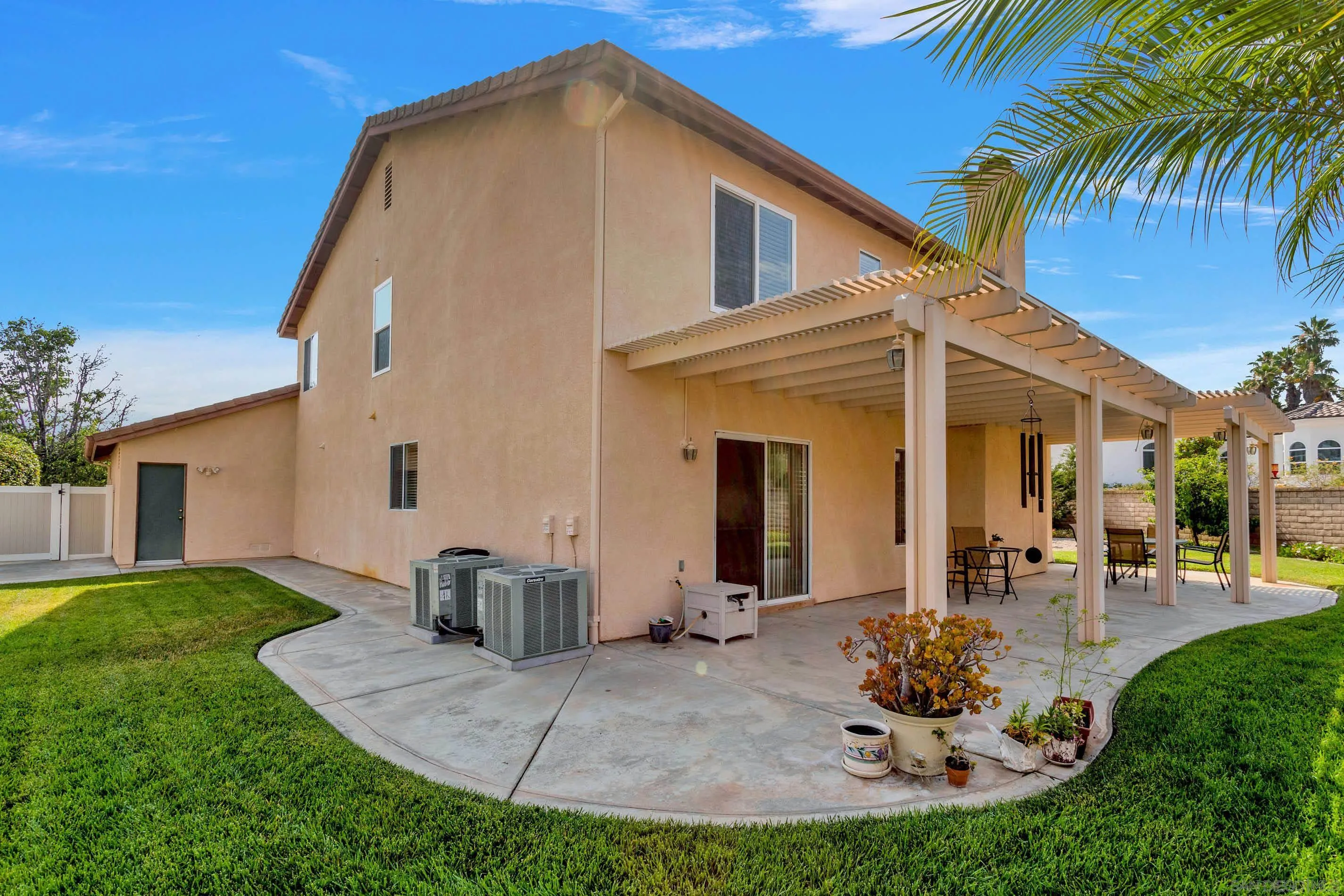 3080 Nightwind Circle Corona, CA 92882 - Photo 51 of 62 a view of a house with backyard porch and sitting area
